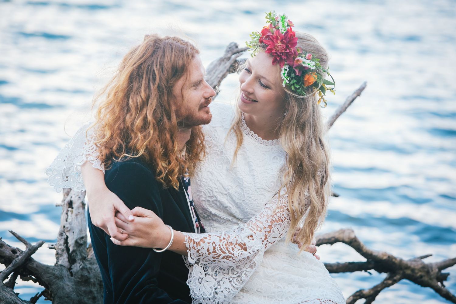 Seaside wedding photography with couples sharing intimate moments near the water.