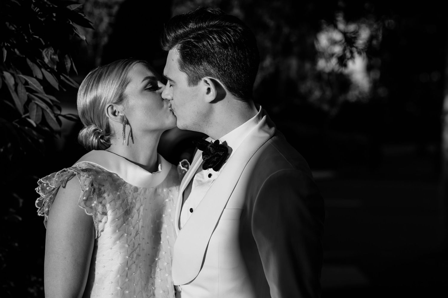 Dramatic evening portraits of newlyweds in intimate poses.
