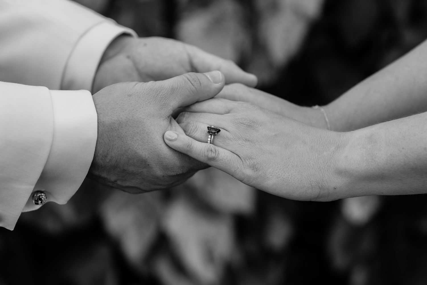 Close-up shots of hands and rings during wedding ceremony moments.
