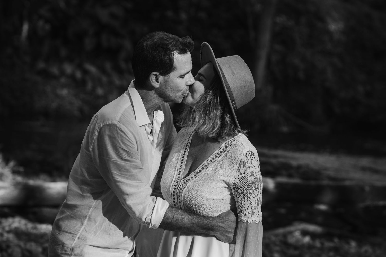A tender moment captured in black and white between a couple in an outdoor setting.Tallebudgera family photography. Gold Coast