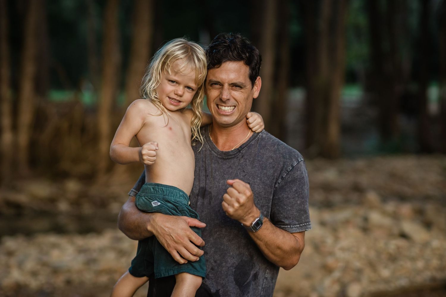 Family enjoying quality time together in a natural outdoor setting.Gold Coast candid family photographer.