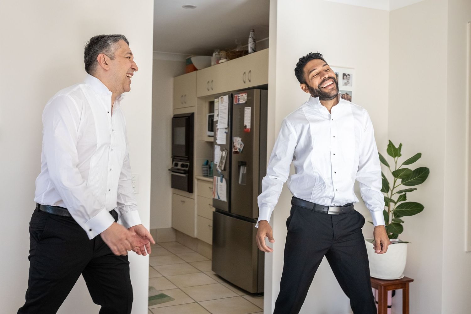 A sequence of playful candid moments captured between two people in white dress shirts.
