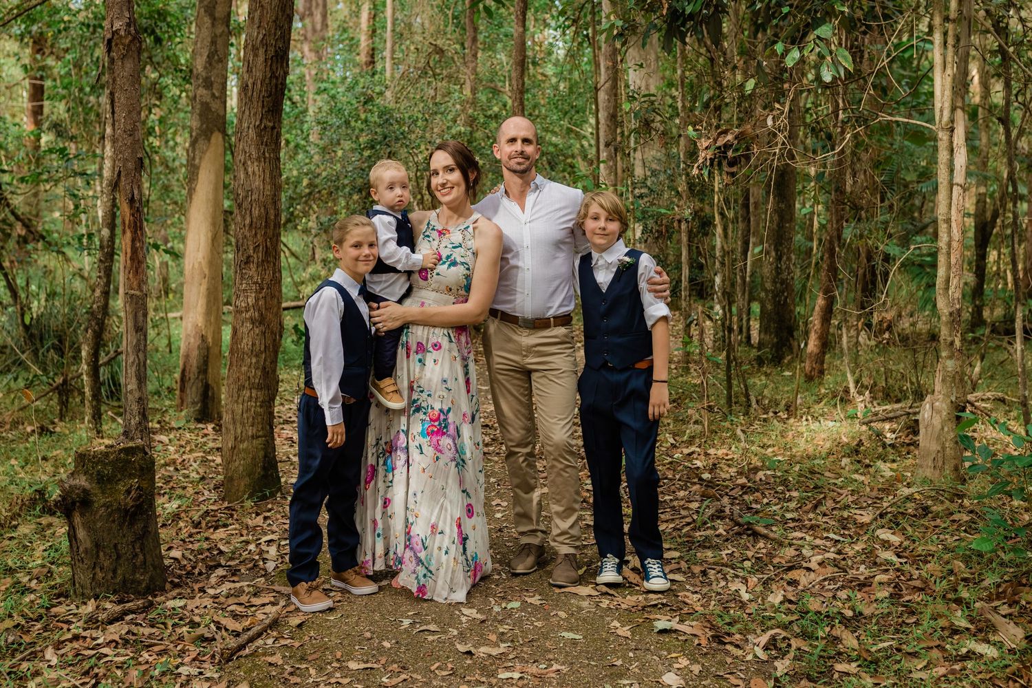 Family portrait taken in a eucalyptus forest setting.Gold Coast elopement photographer