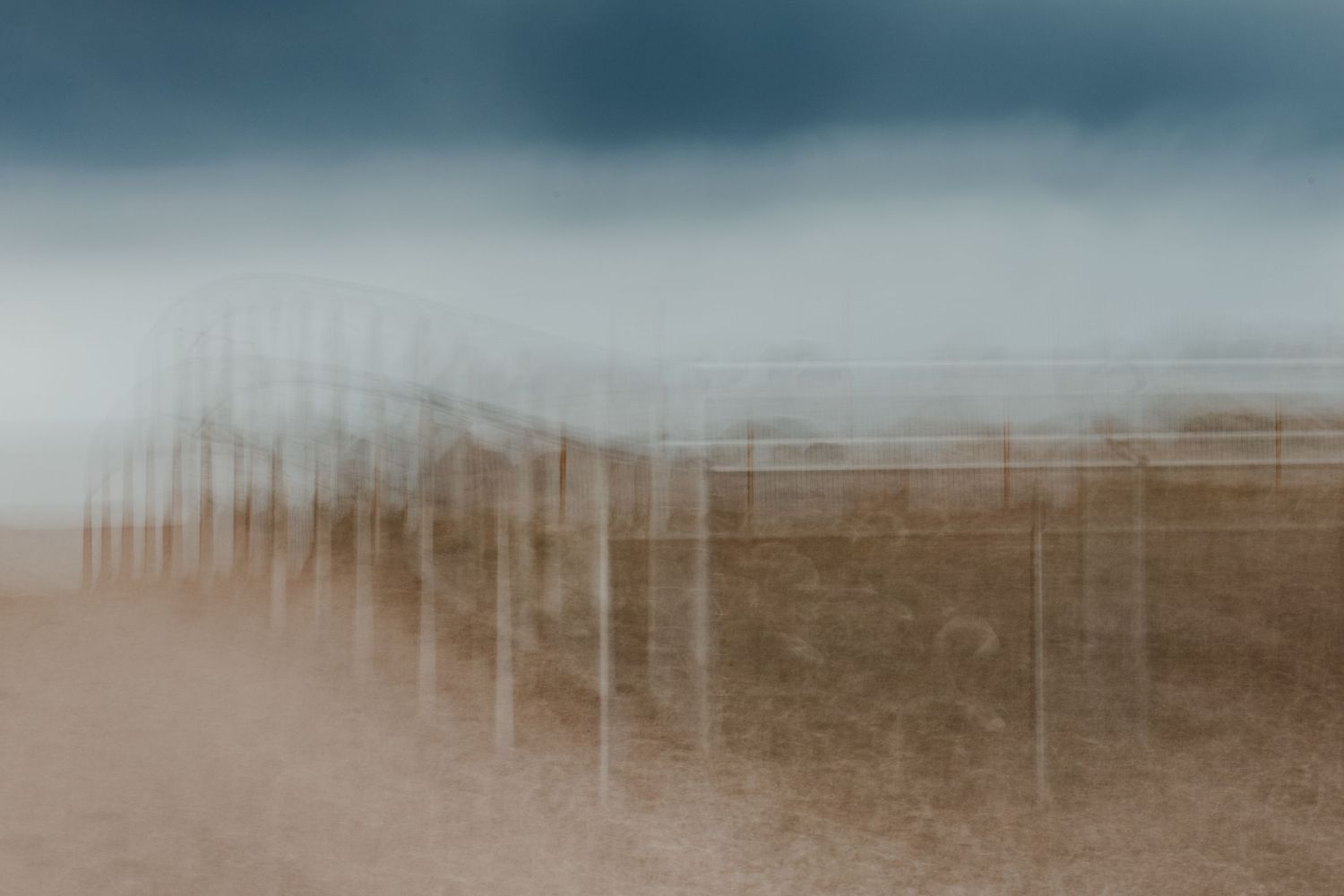 Abstract landscape with misty blue horizon and blurred motion effect.