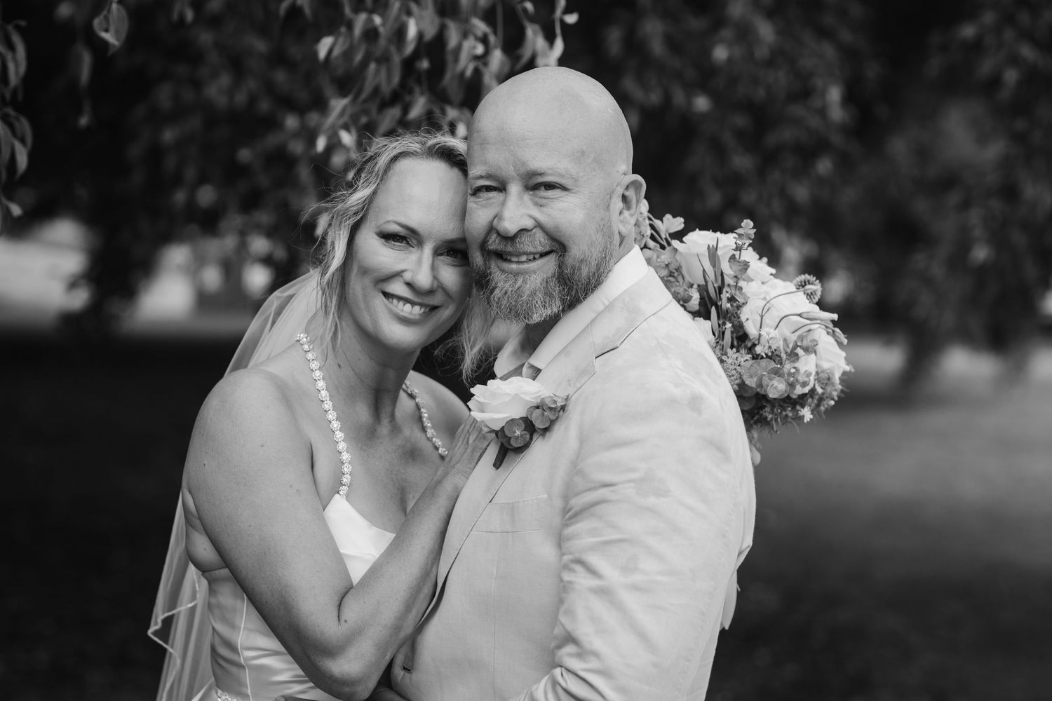 Romantic black and white portrait of couple embracing outdoors.New farm park wedding photos in Brisbane