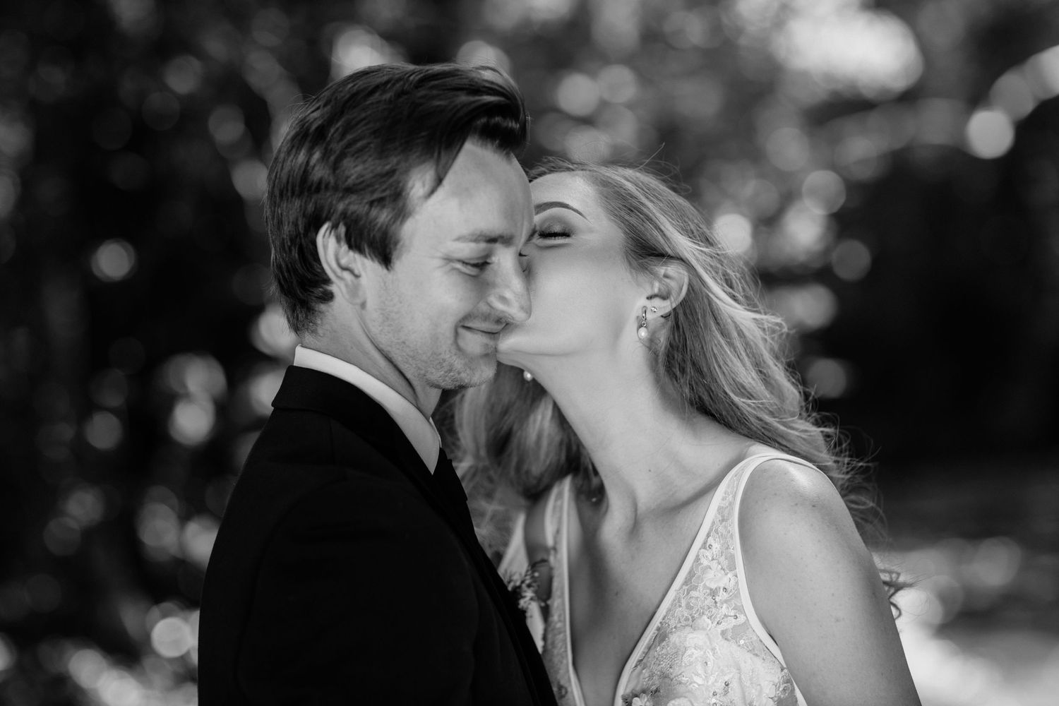 Black and white wedding portraits capture tender moments between newlyweds.Currumbin Valley wedding photography Gold Coast