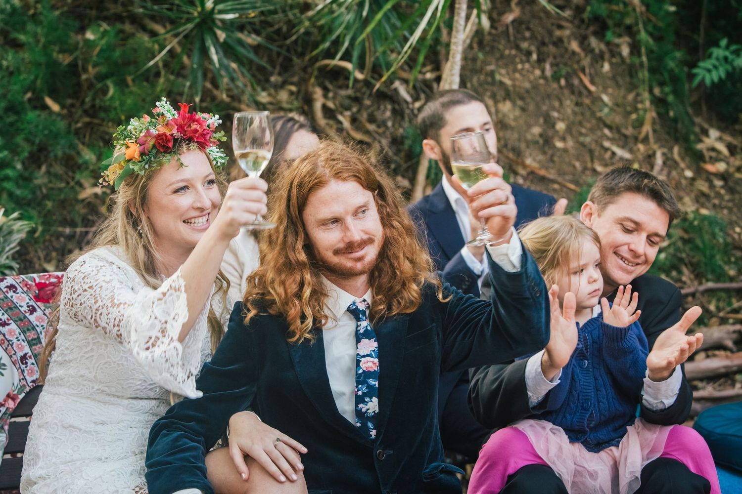 Candid moments of celebration with guests enjoying an outdoor gathering.DIY wedding Gold Coast elopement photographer Gold Coast