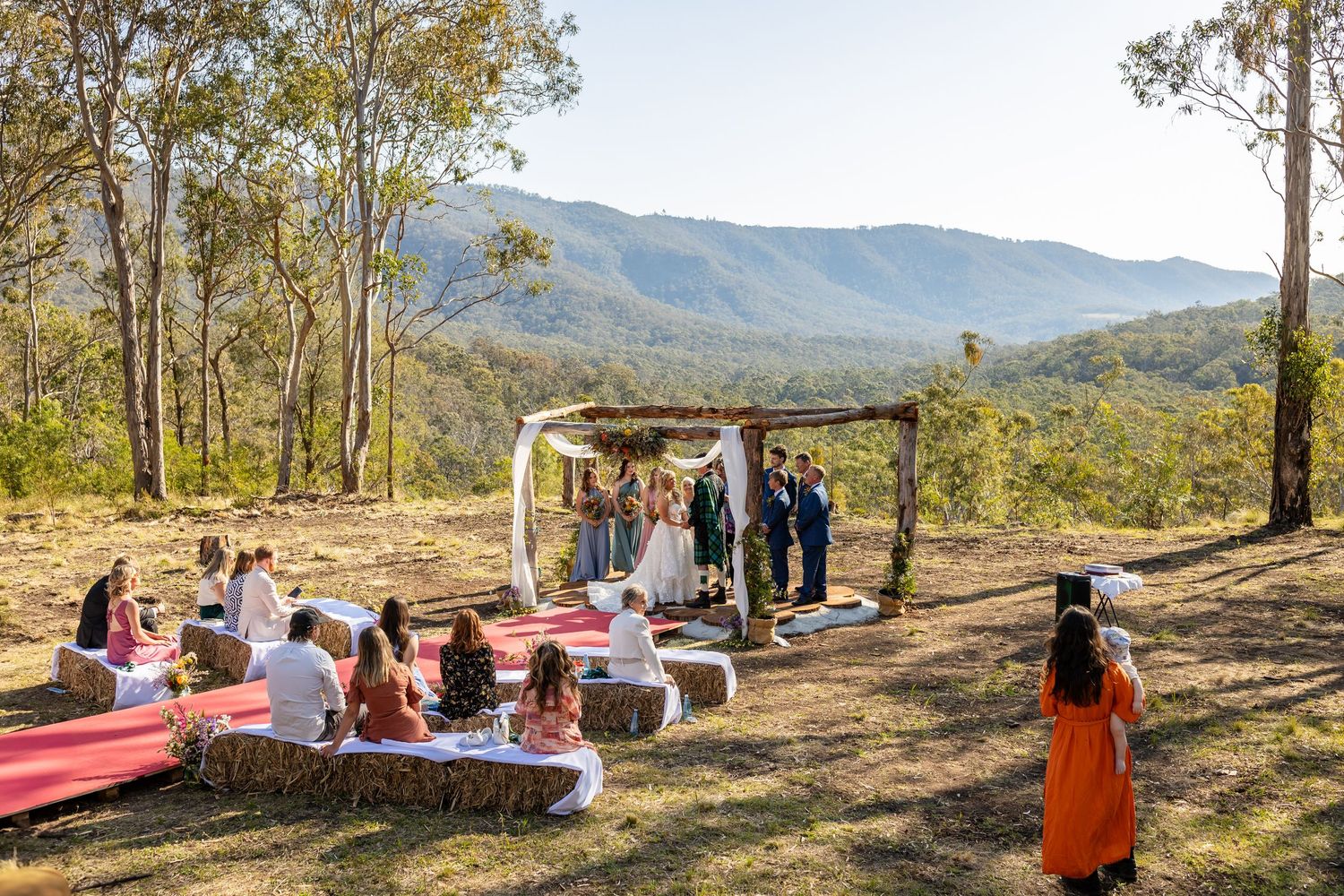 Panoramic view of outdoor wedding venue with mountains and natural landscape.Gold Coast wedding photographer