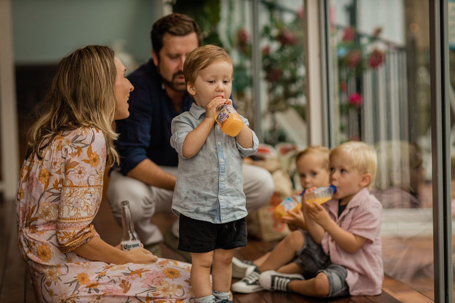 Family gathering at a casual indoor restaurant setting.Gold Coast elopement photographer