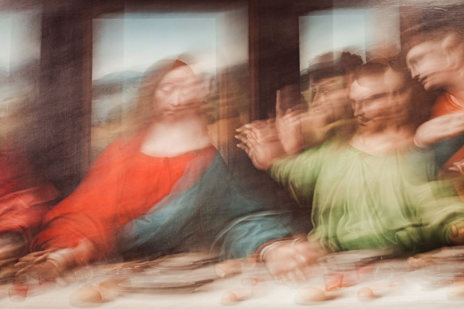 Motion blur abstract of warm colors creating horizontal streaks.