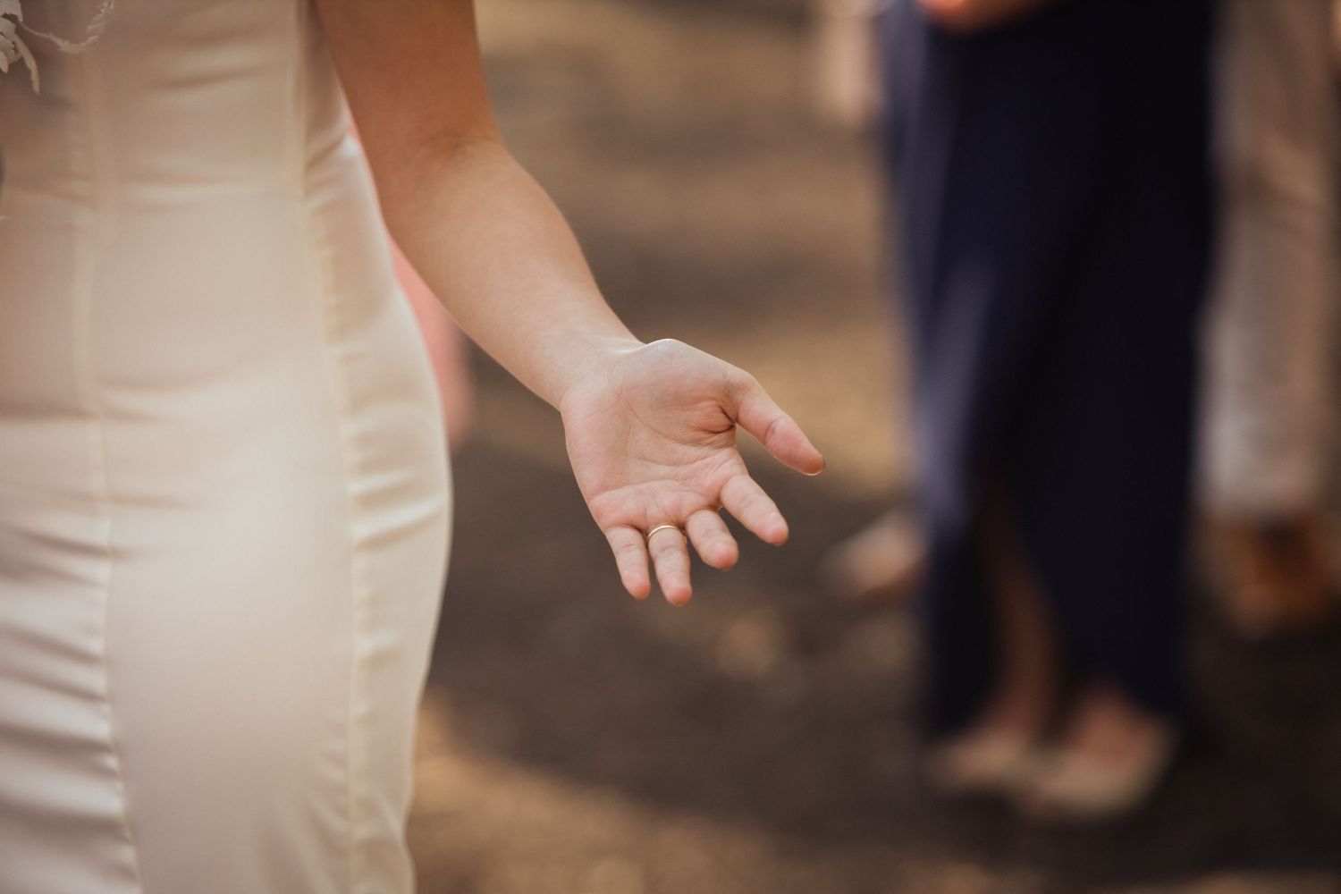 Close-up detail of an elegant white wedding dress in natural lighting.pizzey park wedding Gold Coast