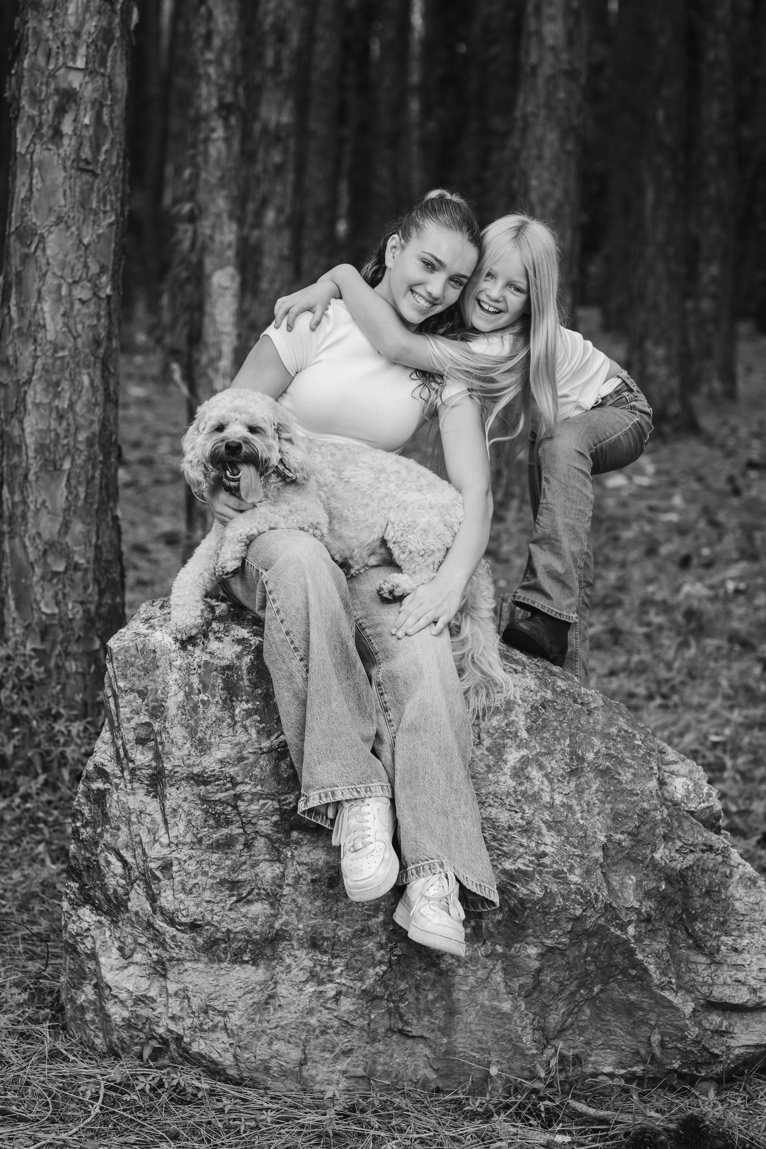 Black and white forest photography capturing intimate moments on fallen logs.Pizzey park family photos. Gold Coast