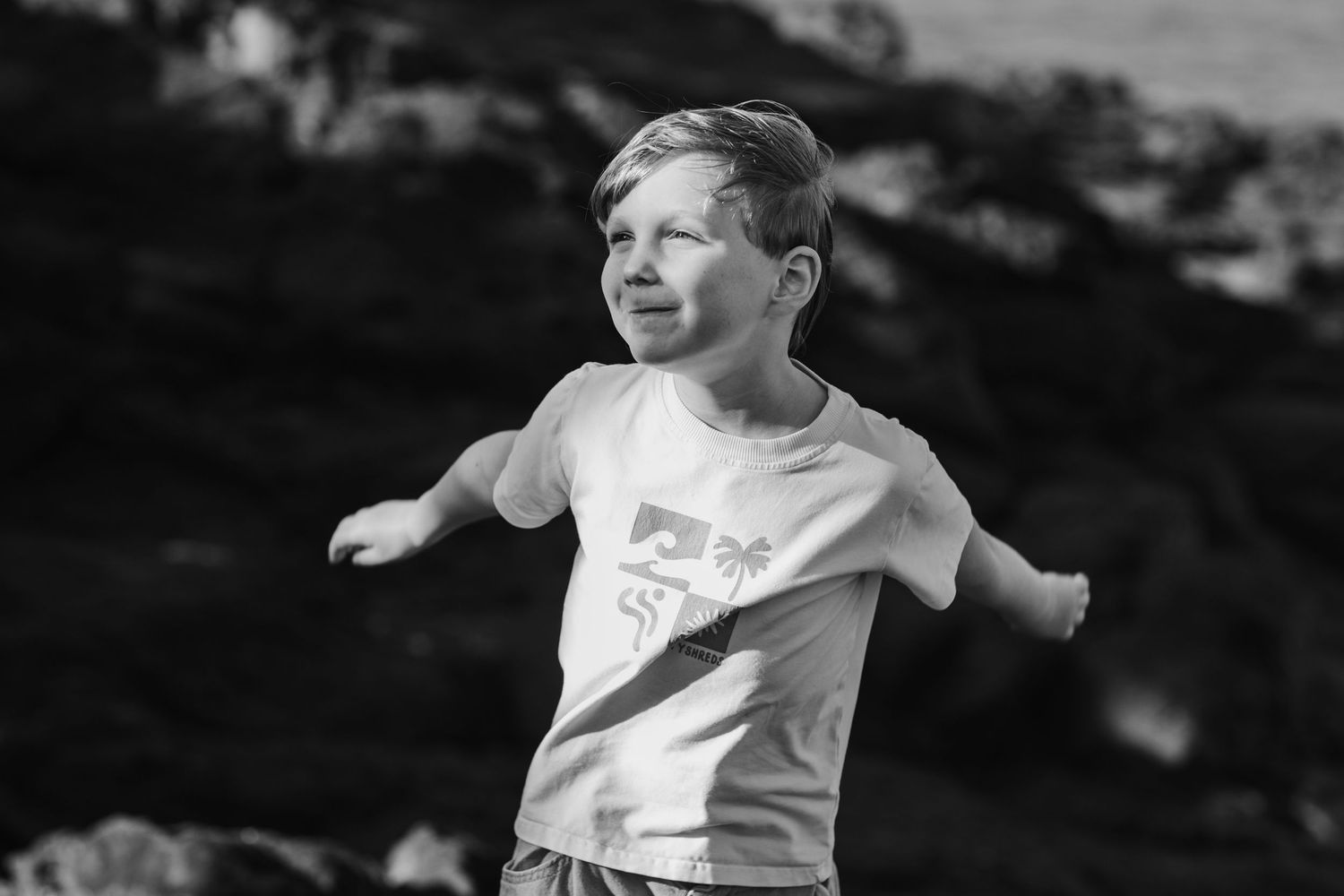Black and white portrait of people in casual summer attire.Gold Coast candid family photographer.