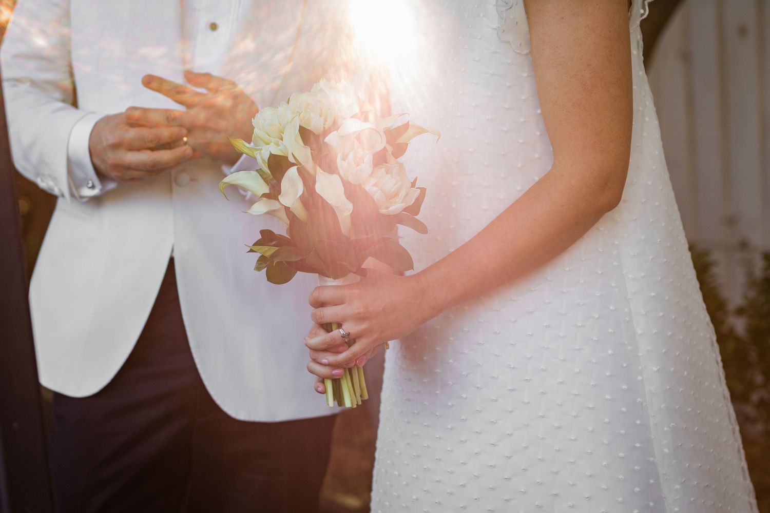 Elegant wedding details with white floral arrangements and formal attire.The refinery wedding venue. Brisbane.