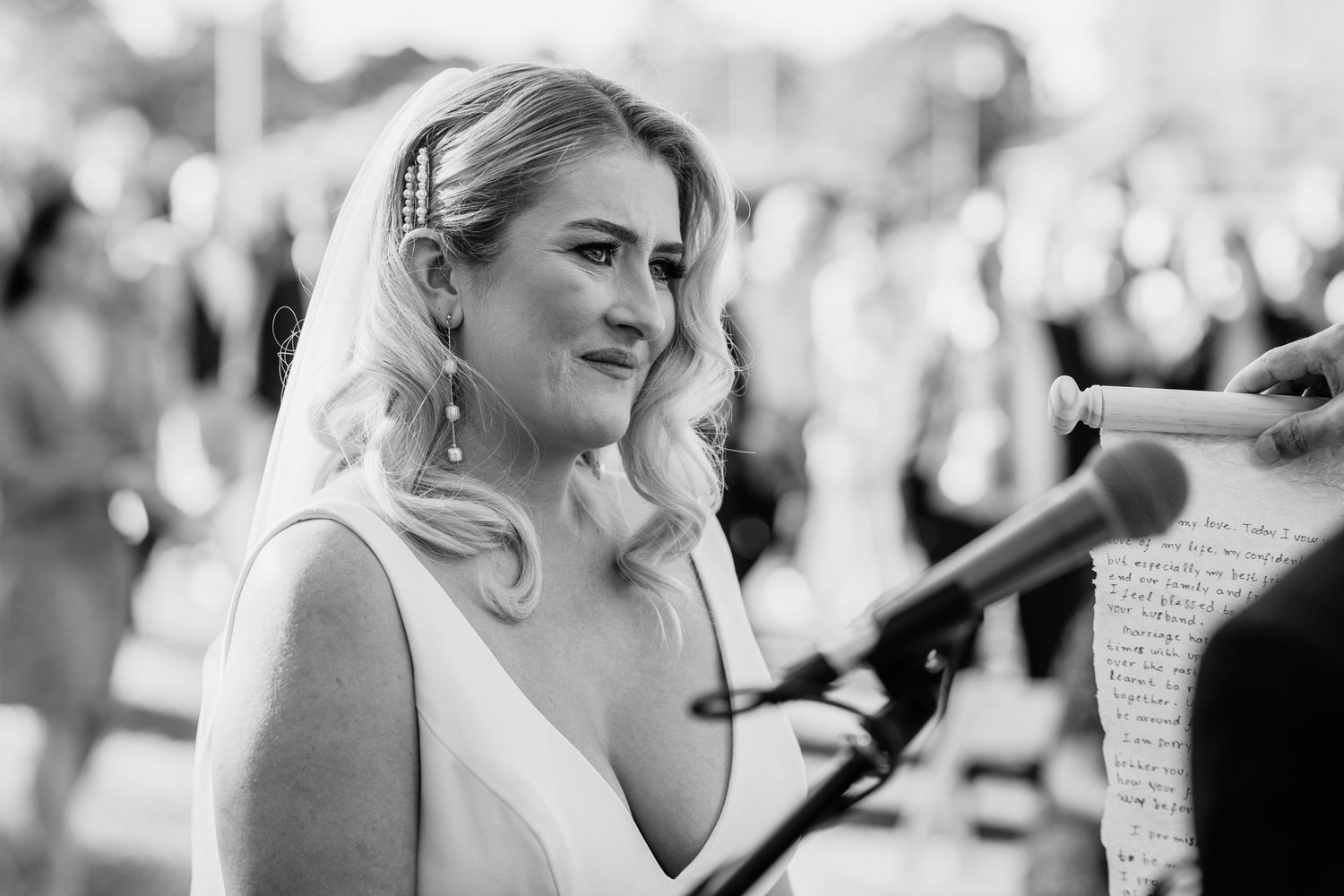 Black and white photo of an emotional wedding ceremony moment. Surfers Paradise Golf Club wedding.