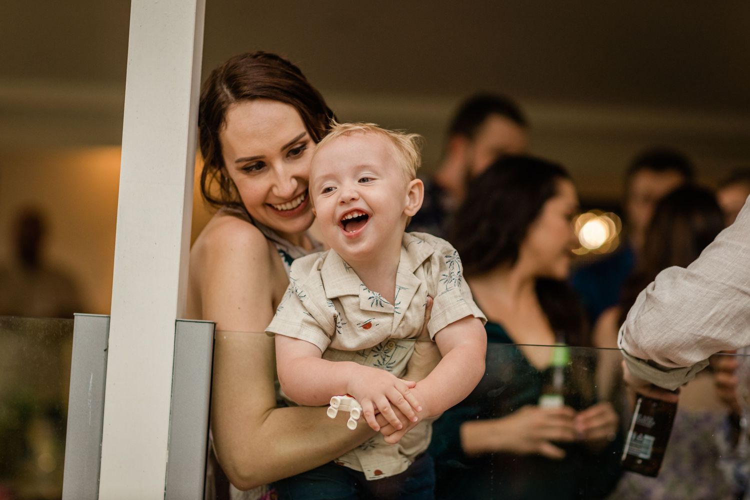 Emotional moments shared during an indoor celebration event.Gold Coast elopement photographer