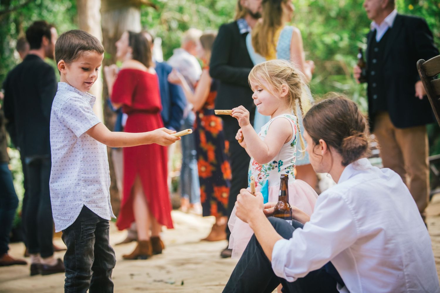 Children playing and interacting during outdoor wedding reception festivities.DIY wedding Gold Coast elopement photographer Gold Coast