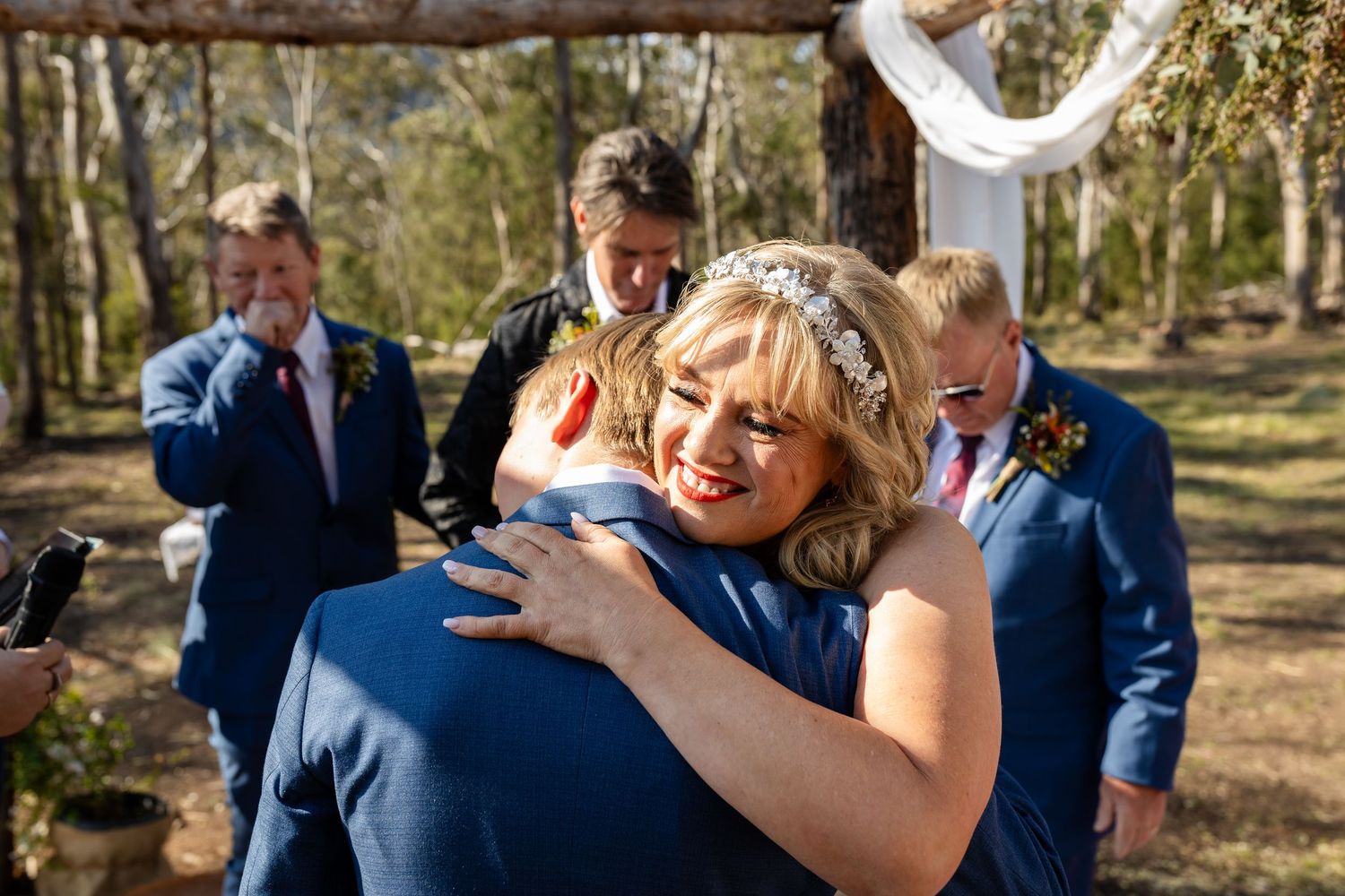 Joyful wedding celebration moments captured in a scenic outdoor setting.