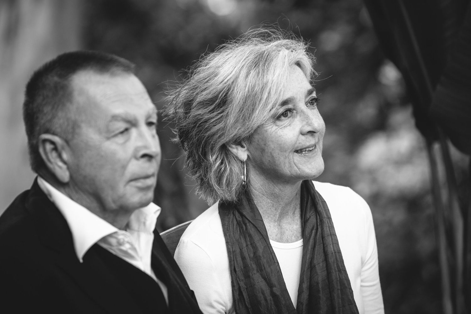 Candid moments captured during an outdoor celebration.