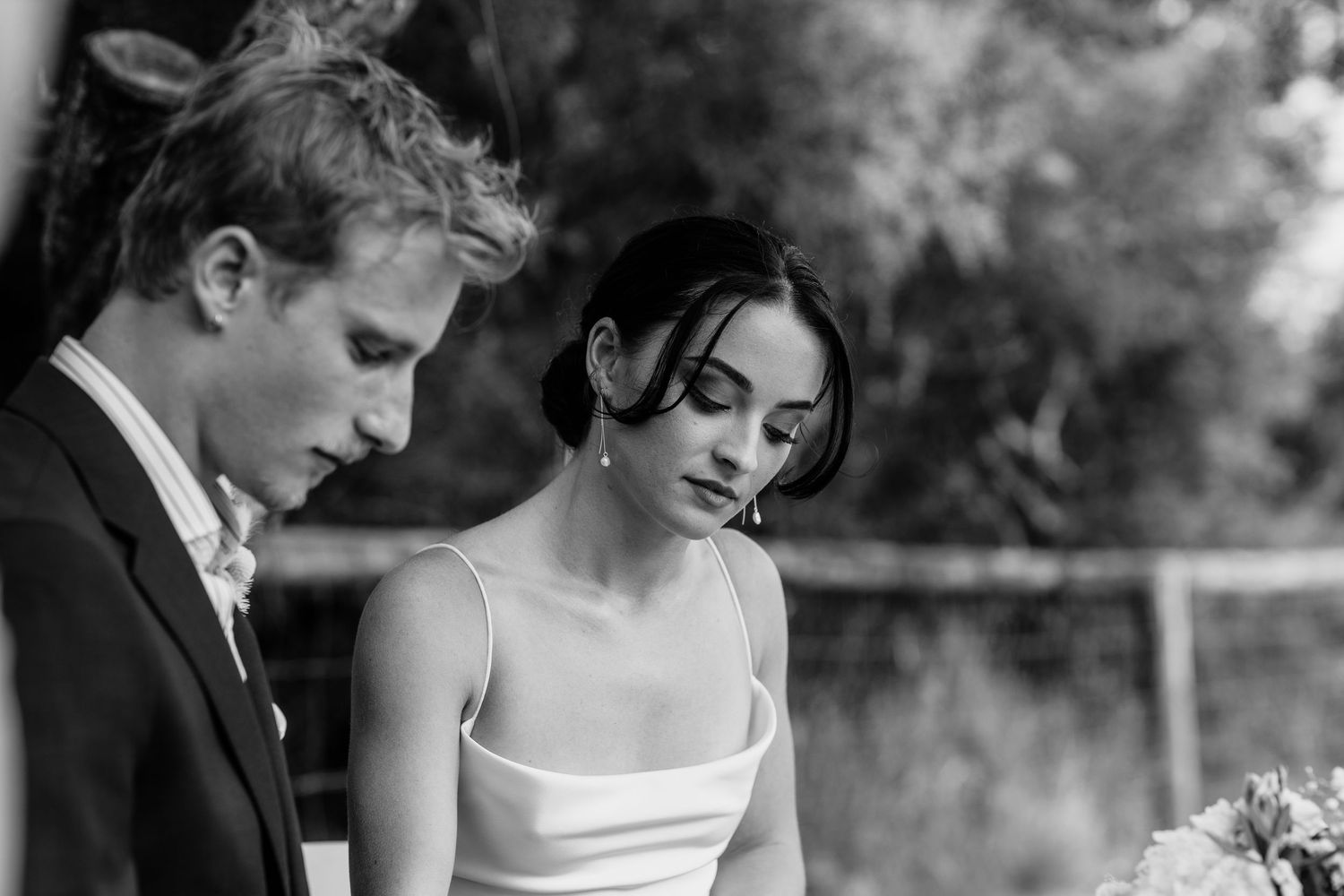 Intimate black and white photo of couple during outdoor wedding ceremony.Miami Burleigh heads beach wedding