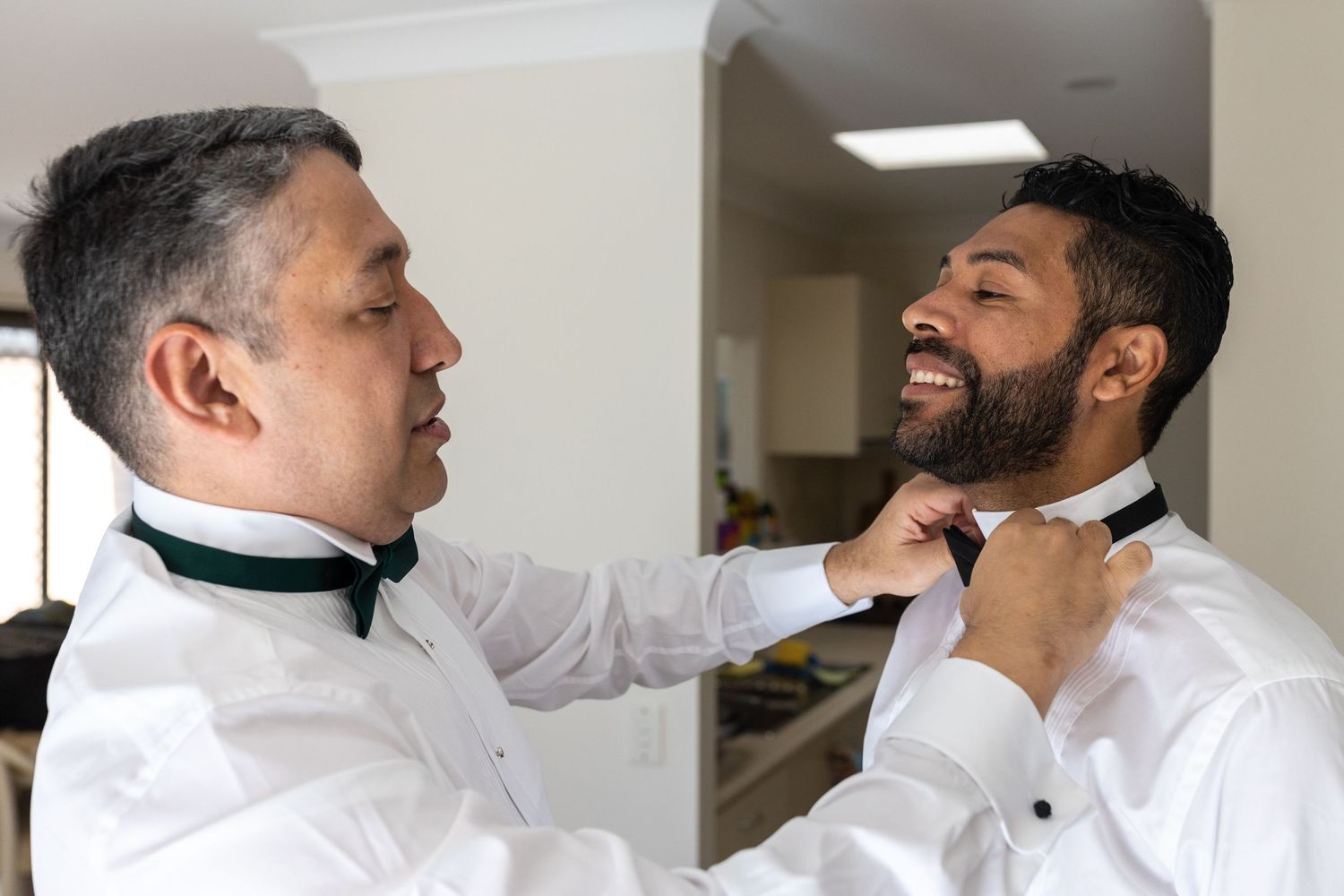 A series of candid moments showing laughter and camaraderie during wedding day preparations. Surfers Paradise Golf Club wedding.