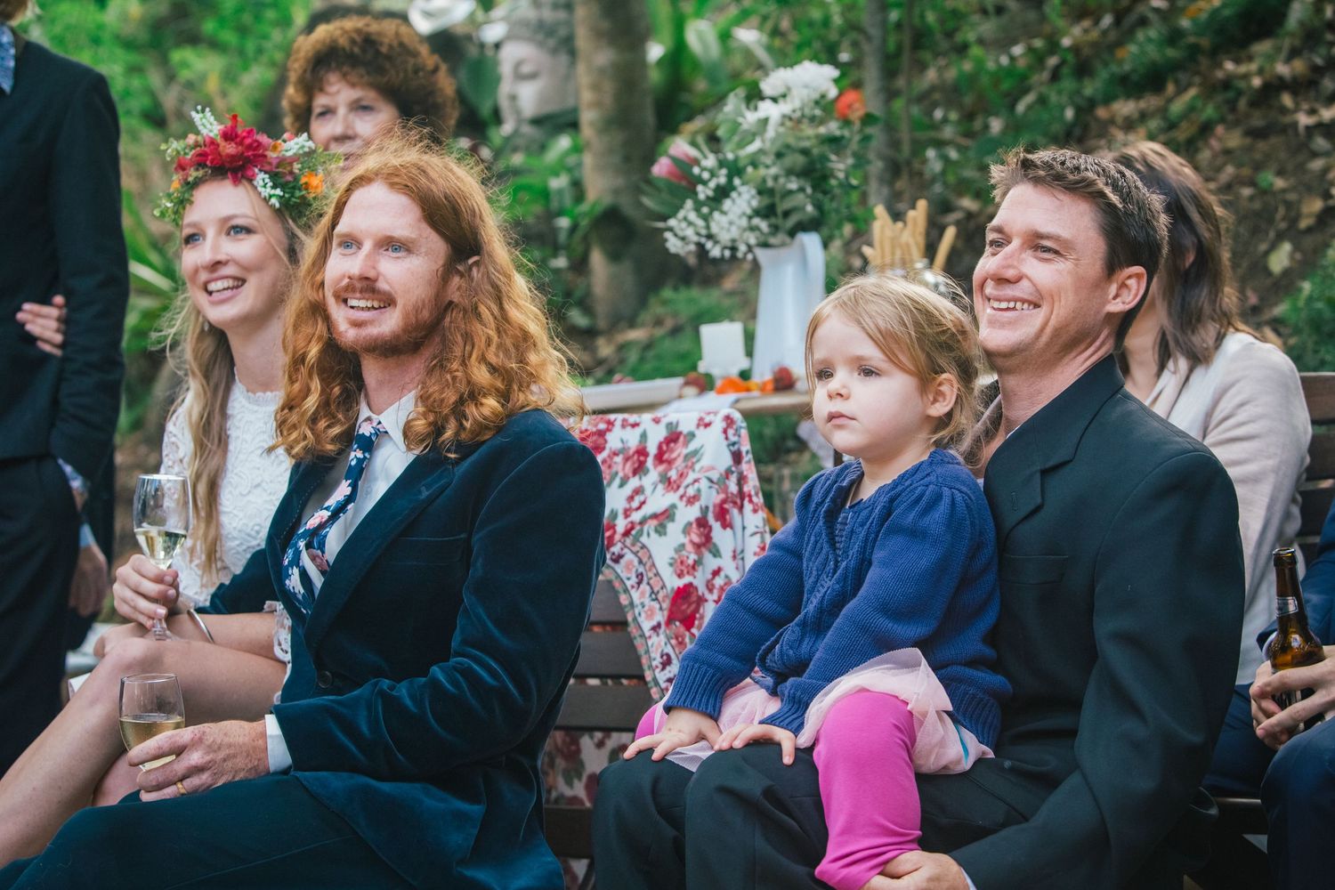 Joyful celebration scene with guests laughing and socializing outdoors.DIY wedding Gold Coast elopement photographer Gold Coast