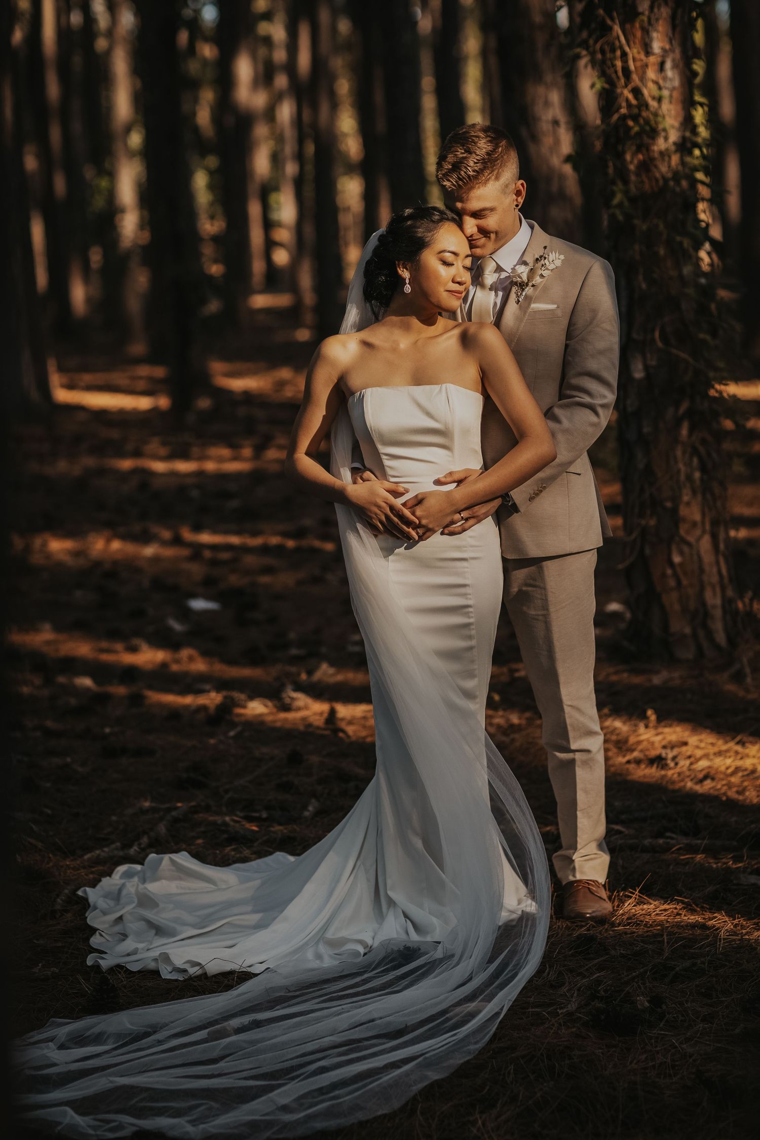Romantic couple portraits in a forest with flowing white wedding dress train.pizzey park wedding Gold Coast