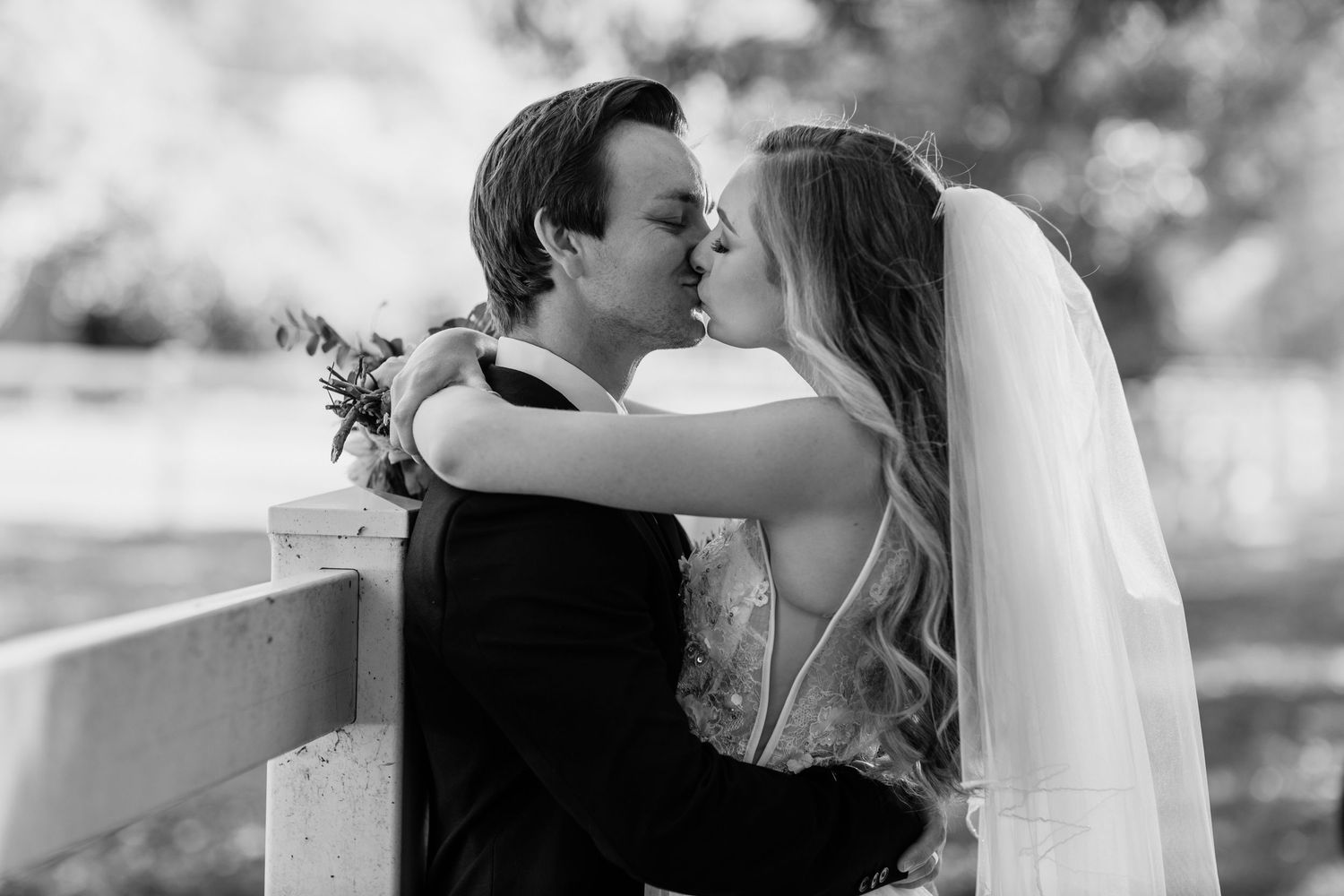 Wedding couple embraces during intimate black and white portrait session.Currumbin Valley wedding photography Gold Coast