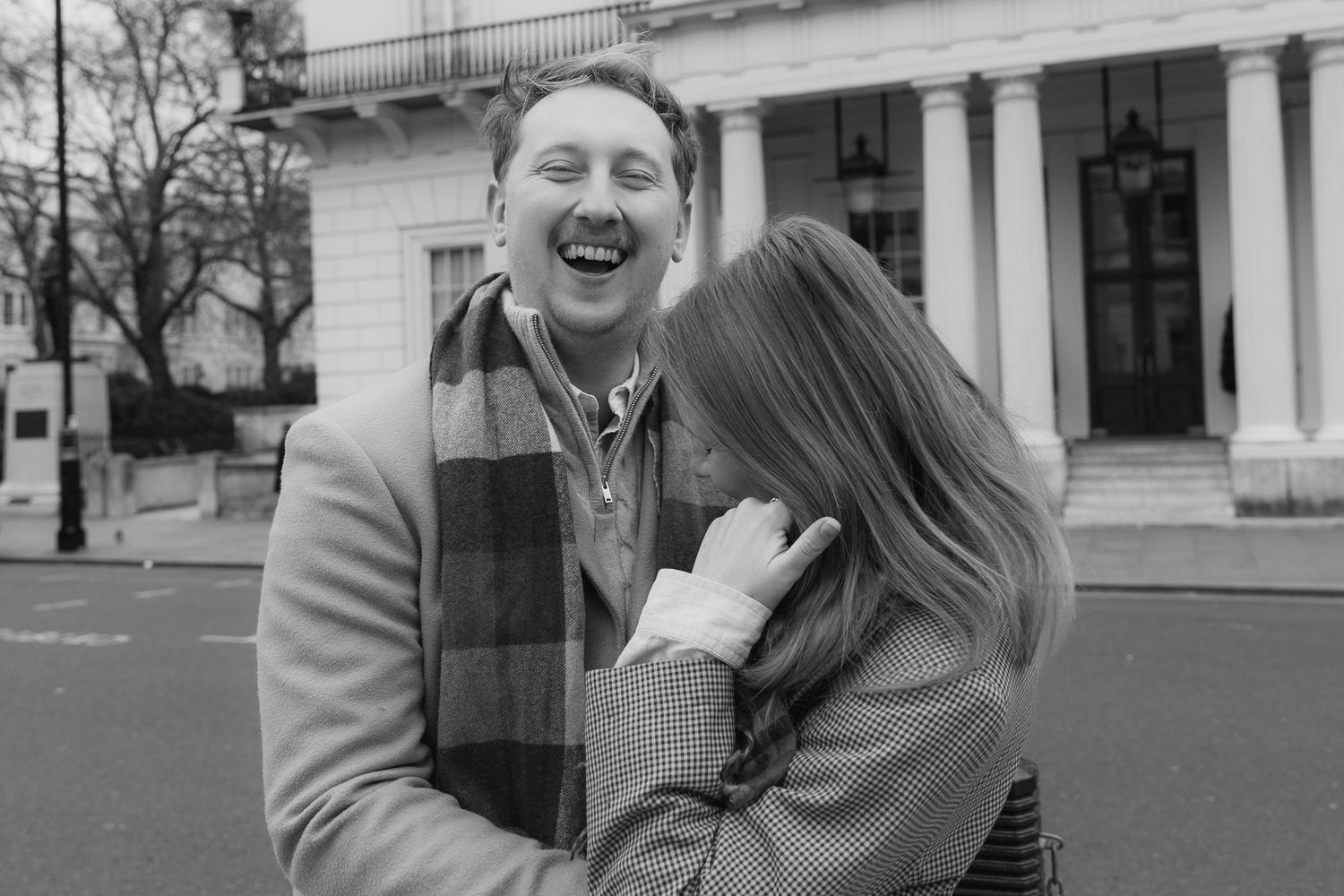 A candid sequence of laughter and joy captured outside a grand white building.