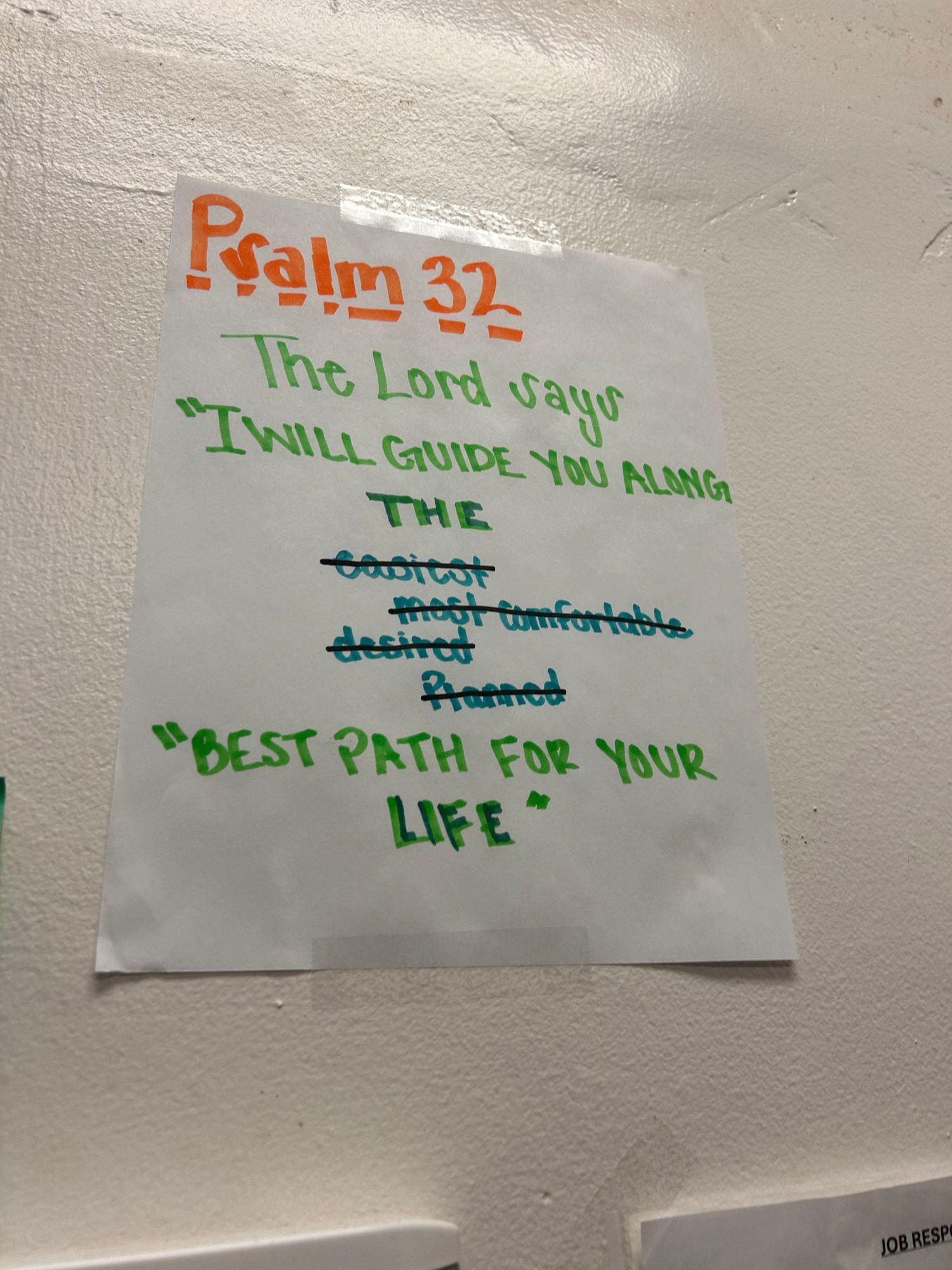 A handwritten note on white paper shows Psalm 32 and a message about the Lord guiding along the best path for life.