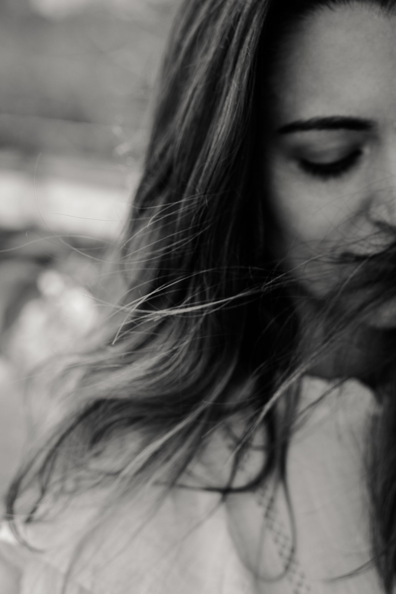 portrait photo of a woman, very sensual, intimate moment capturing a fleeting moment in time with a timeless black and white photo