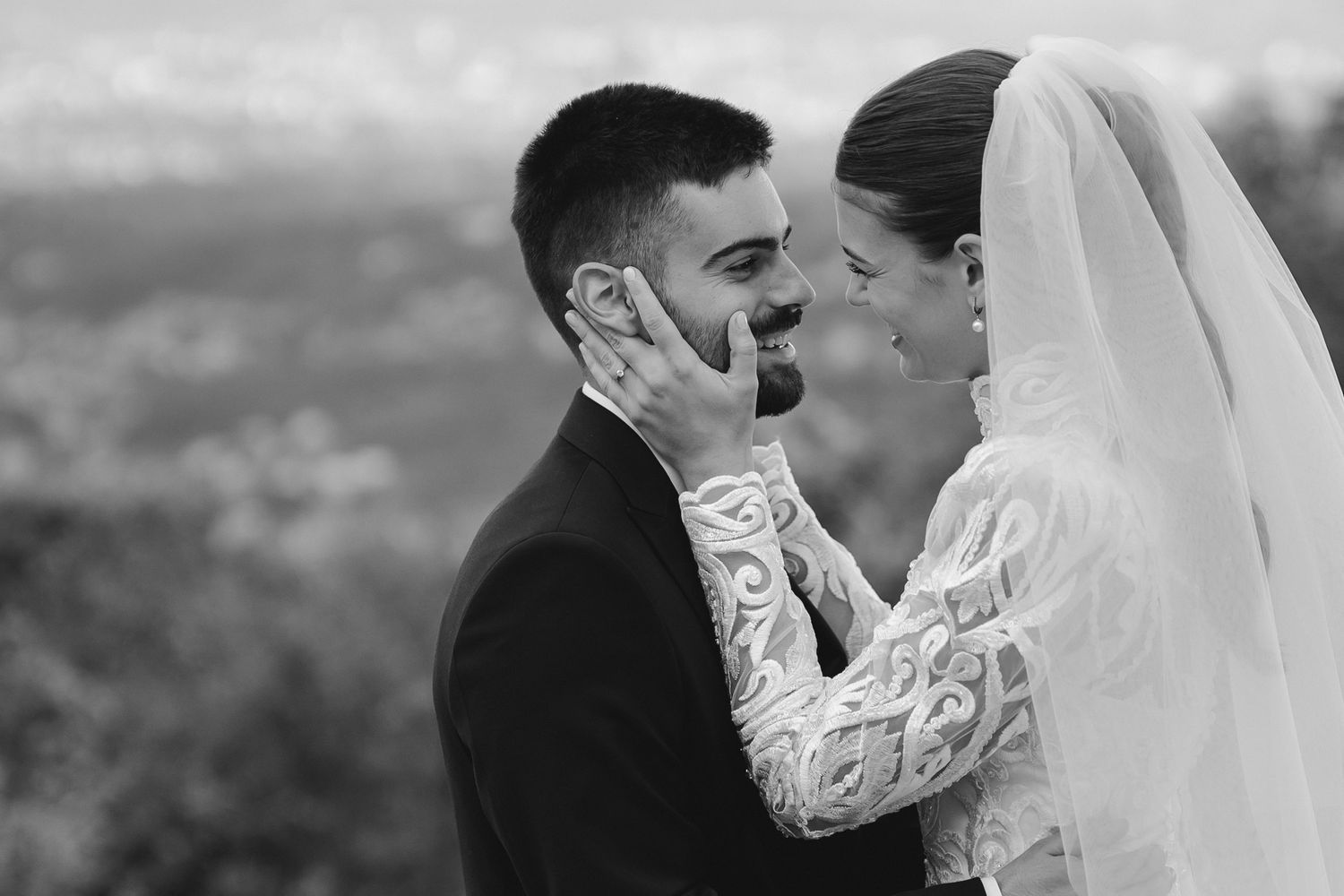 A series of black and white wedding photos showing intimate moments between newlyweds during their celebration.