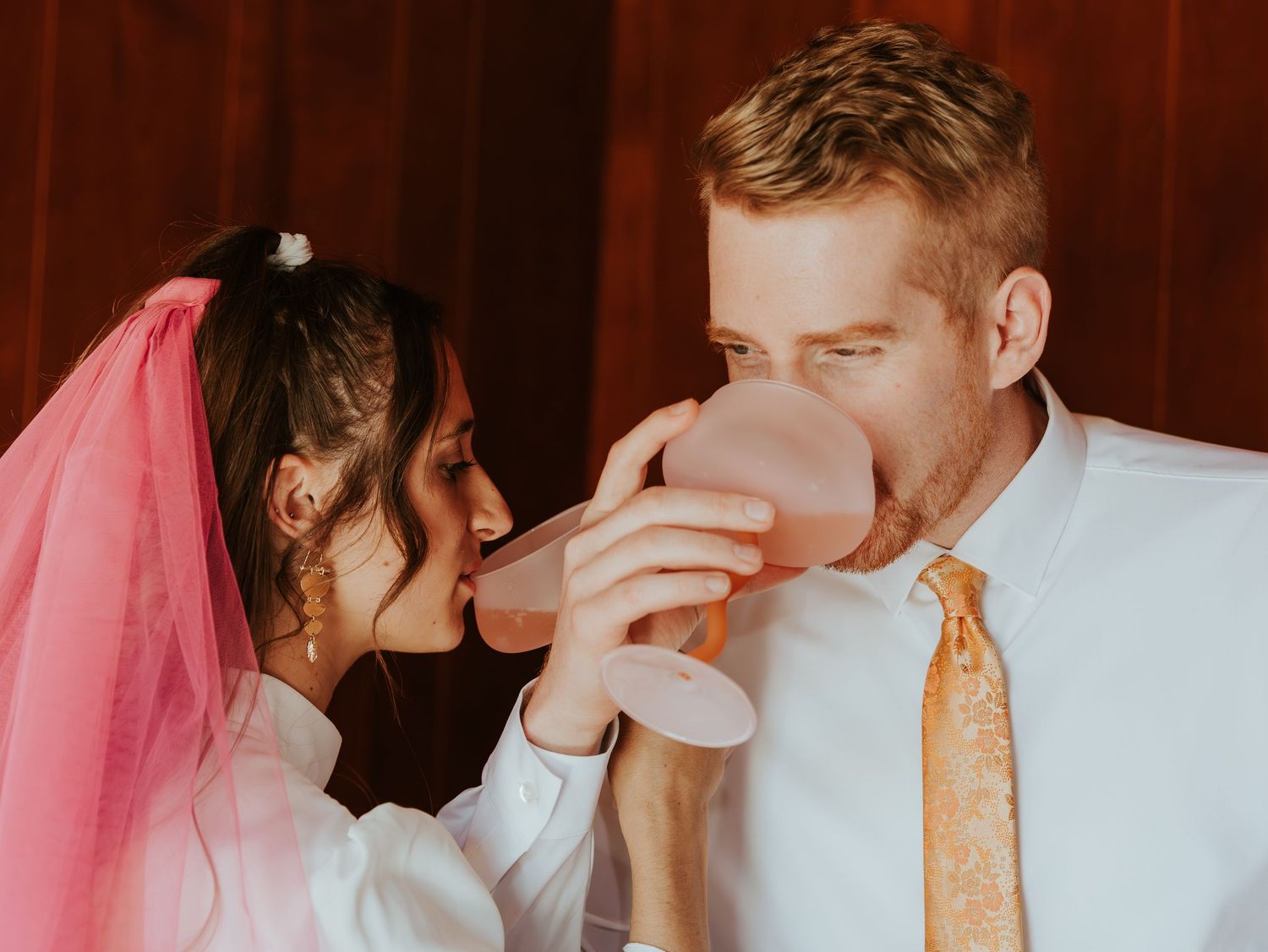 A romantic sequence of wedding couple photos captured in four soft, intimate moments at their celebration.