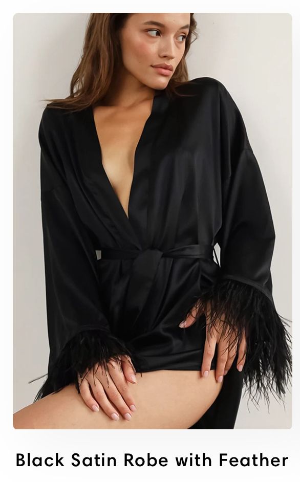Luxurious black satin robe with glamorous feather trim on sleeves and wrap style closure.