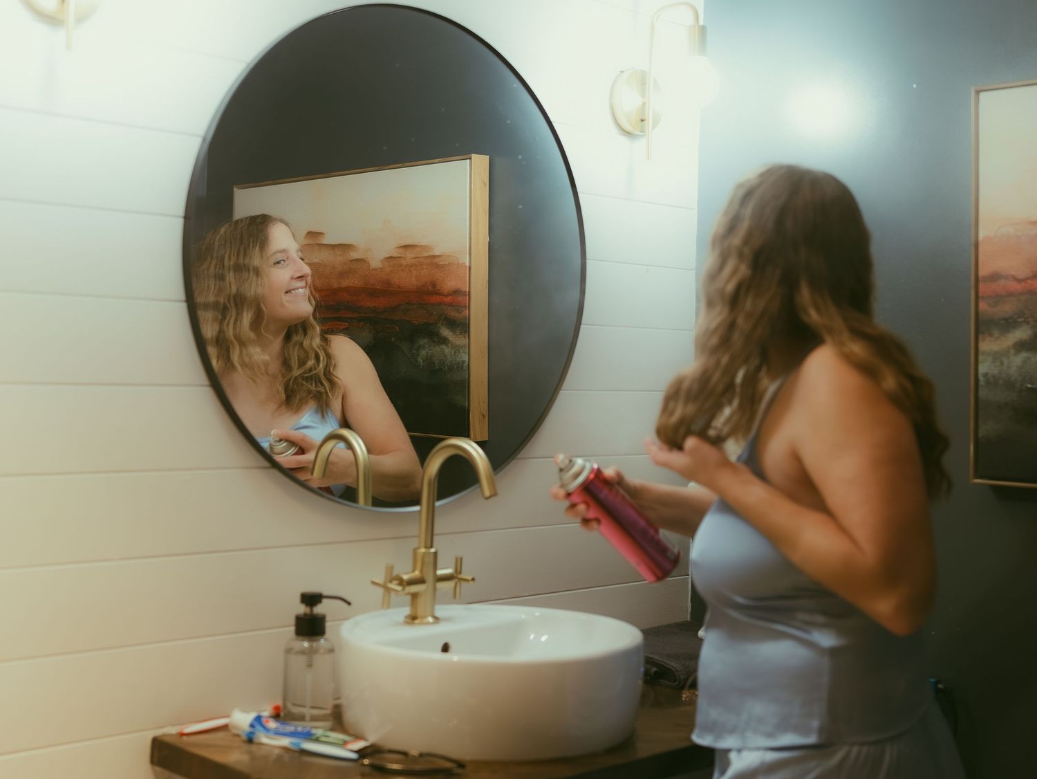 A sequence of bathroom mirror reflections shows someone brushing their teeth at a white sink.