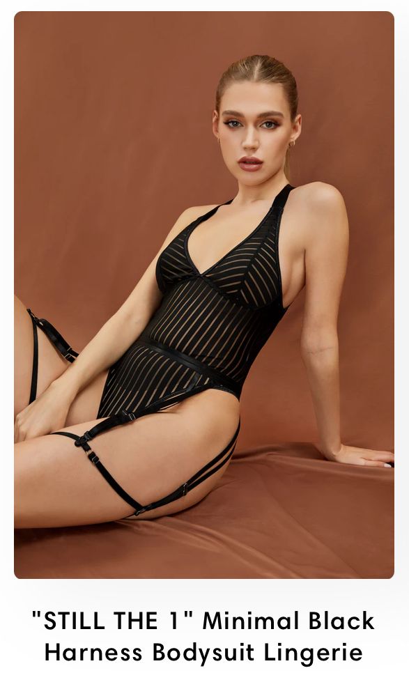 Black pin-striped bodysuit lingerie with harness details against brown backdrop in minimalist fashion photography.