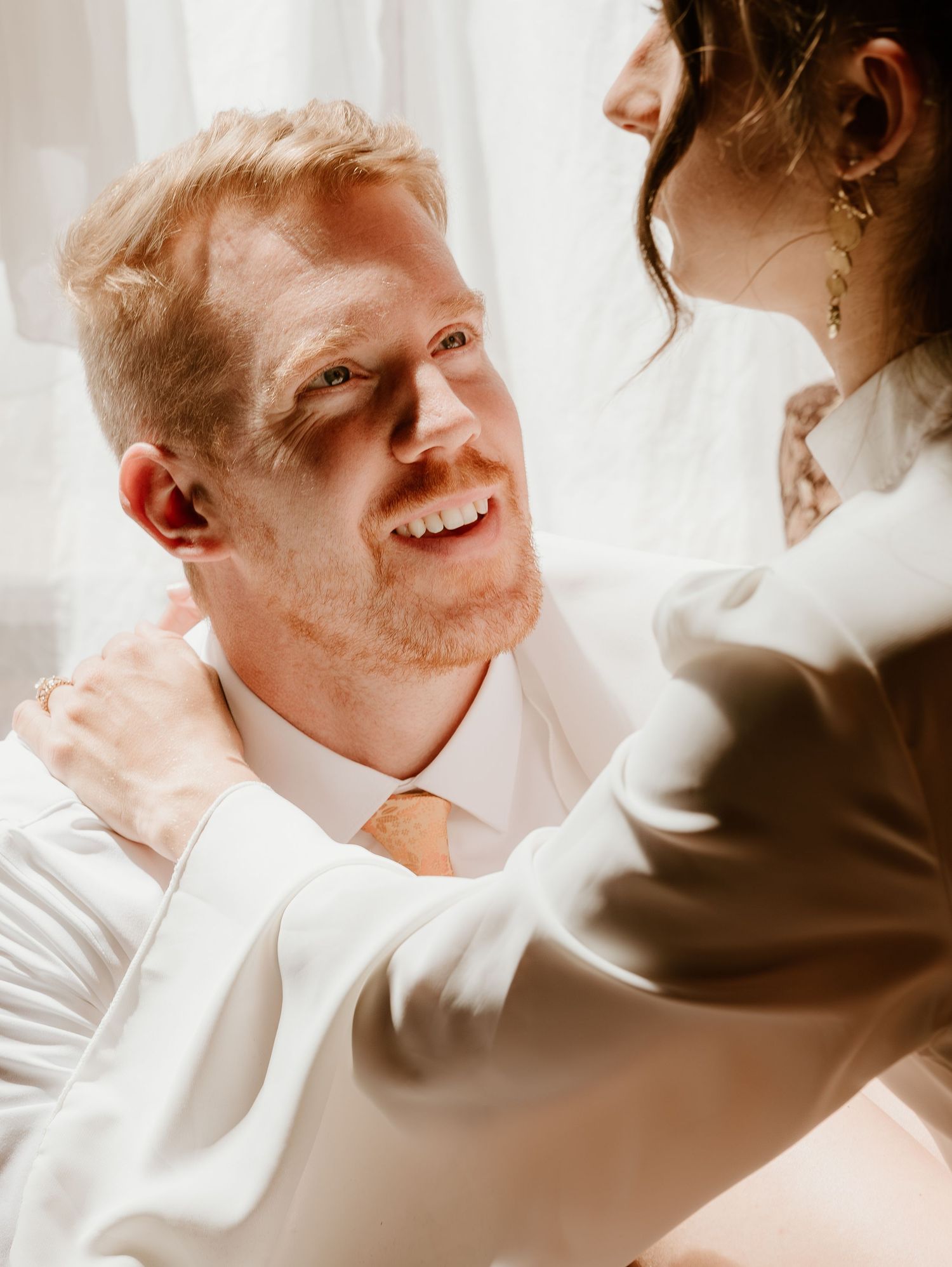 Series of romantic close-up shots with soft natural window lighting.
