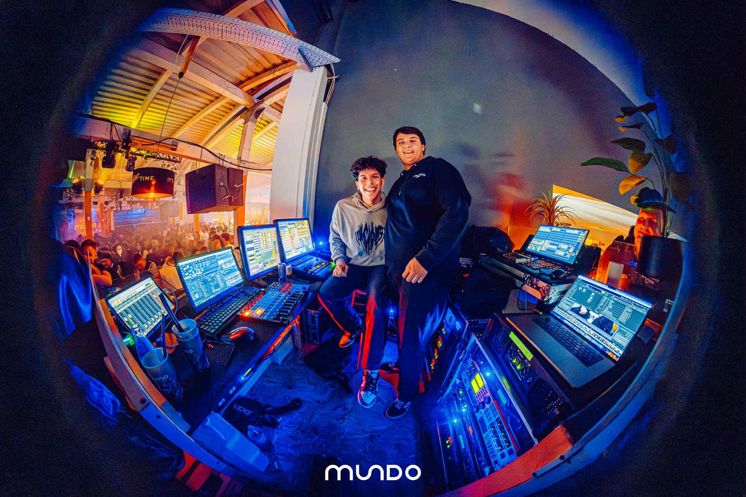 Panoramic sequence showing illuminated blue and red environment with computer monitors and electronic equipment in dim lighting.