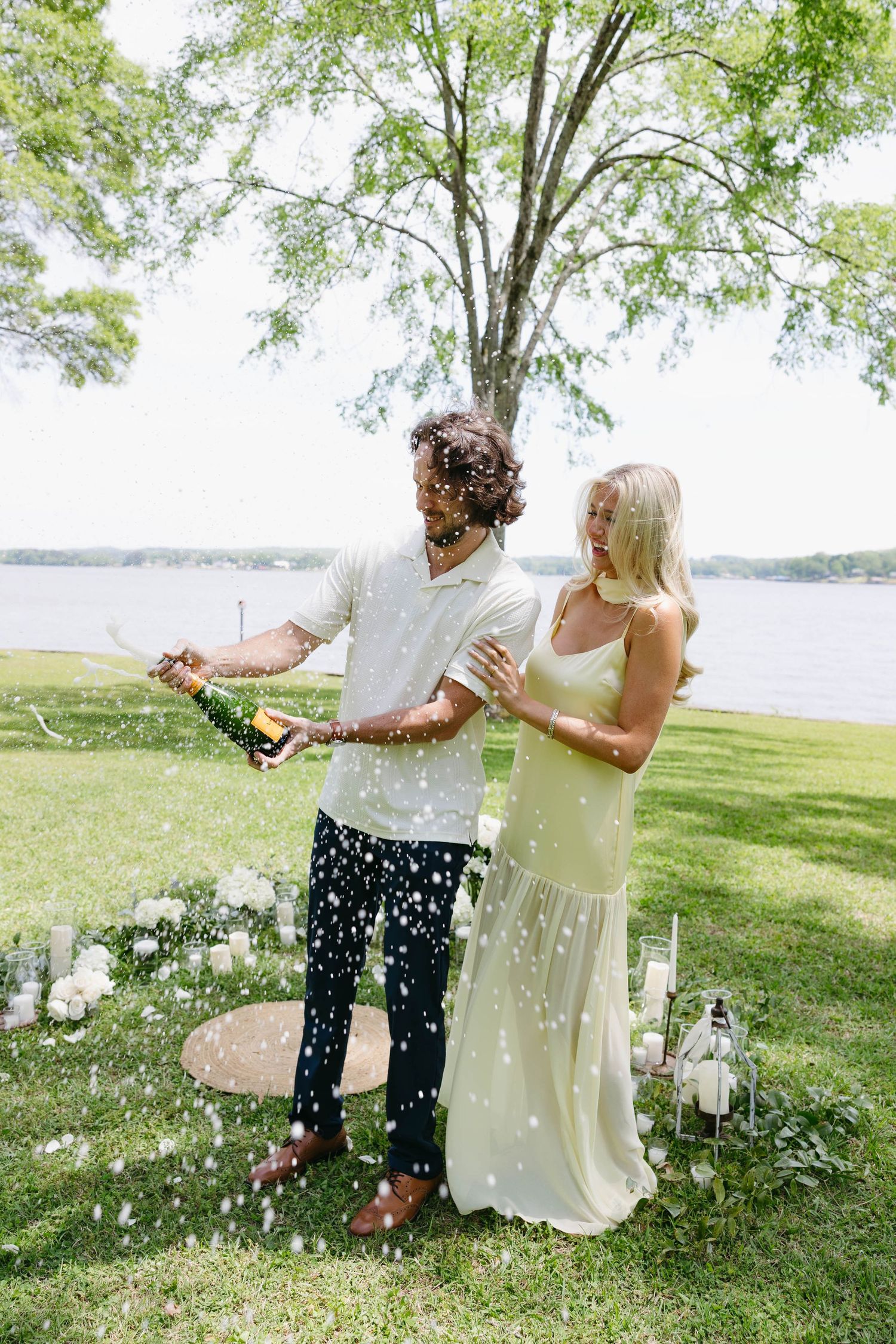 couple photos after their proposal with fiancé wearing a yellow dress from showmeyourmumu
