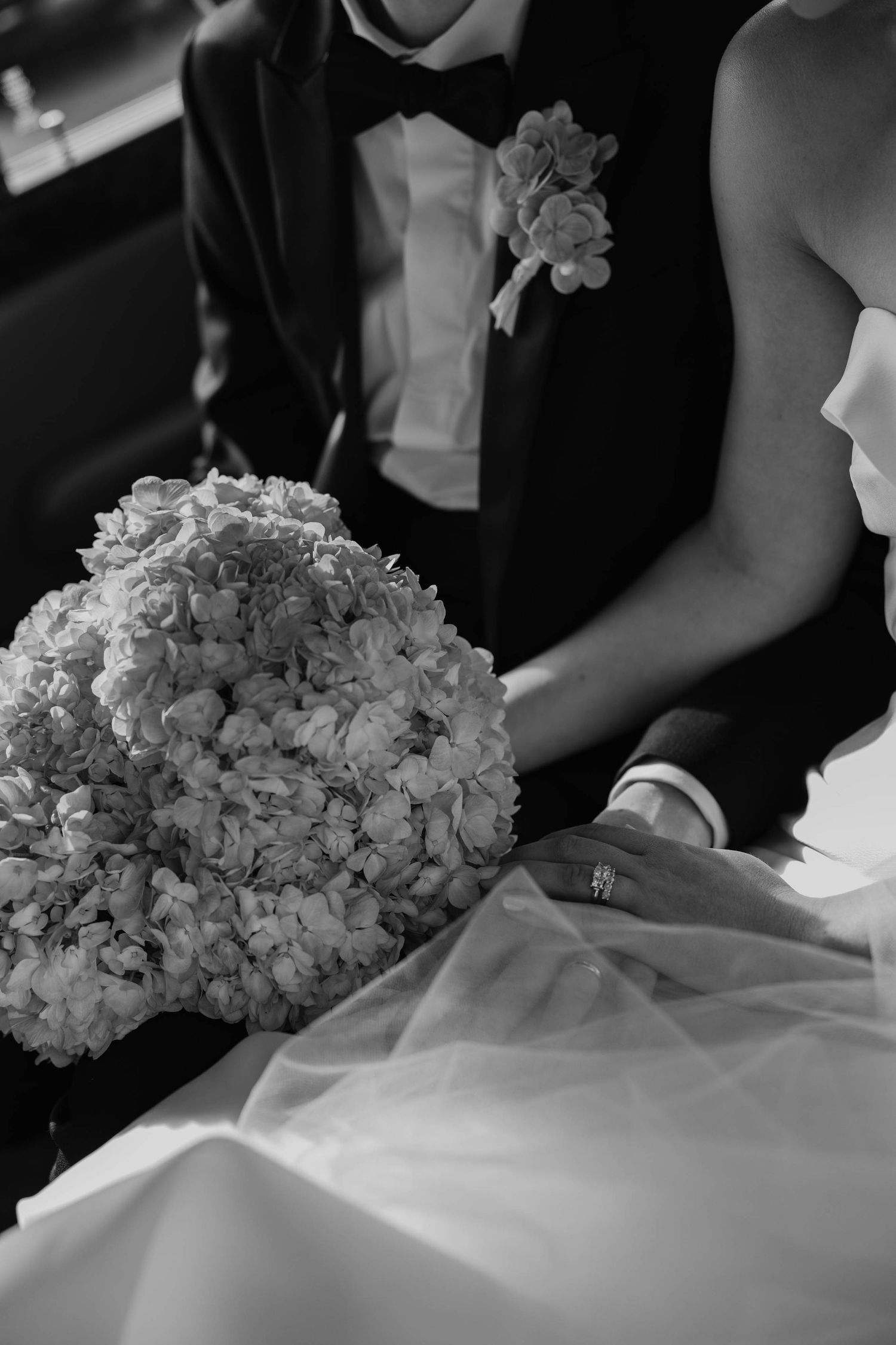 bride and groom holding hands