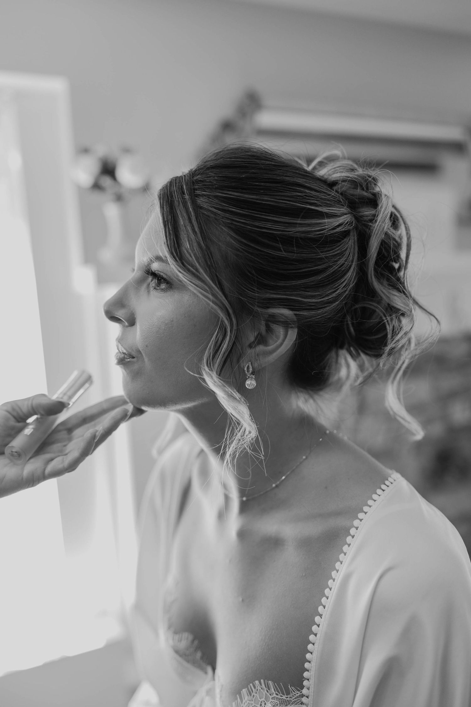 Birmingham Alabama Photographer capturing bride after getting makeup done at Iris Woods Venue in Nashville, Tennessee