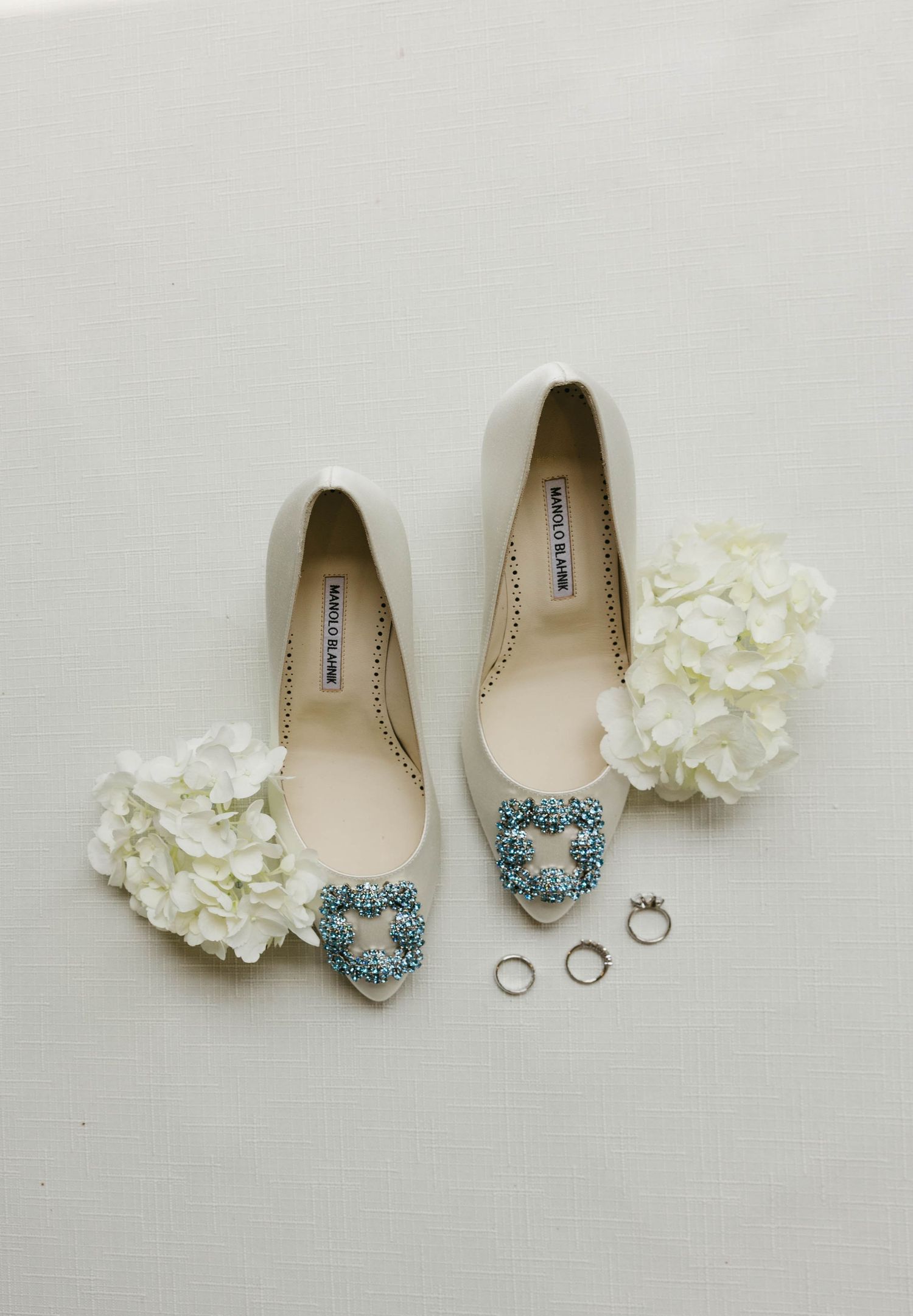 flat lay of bride and groom details