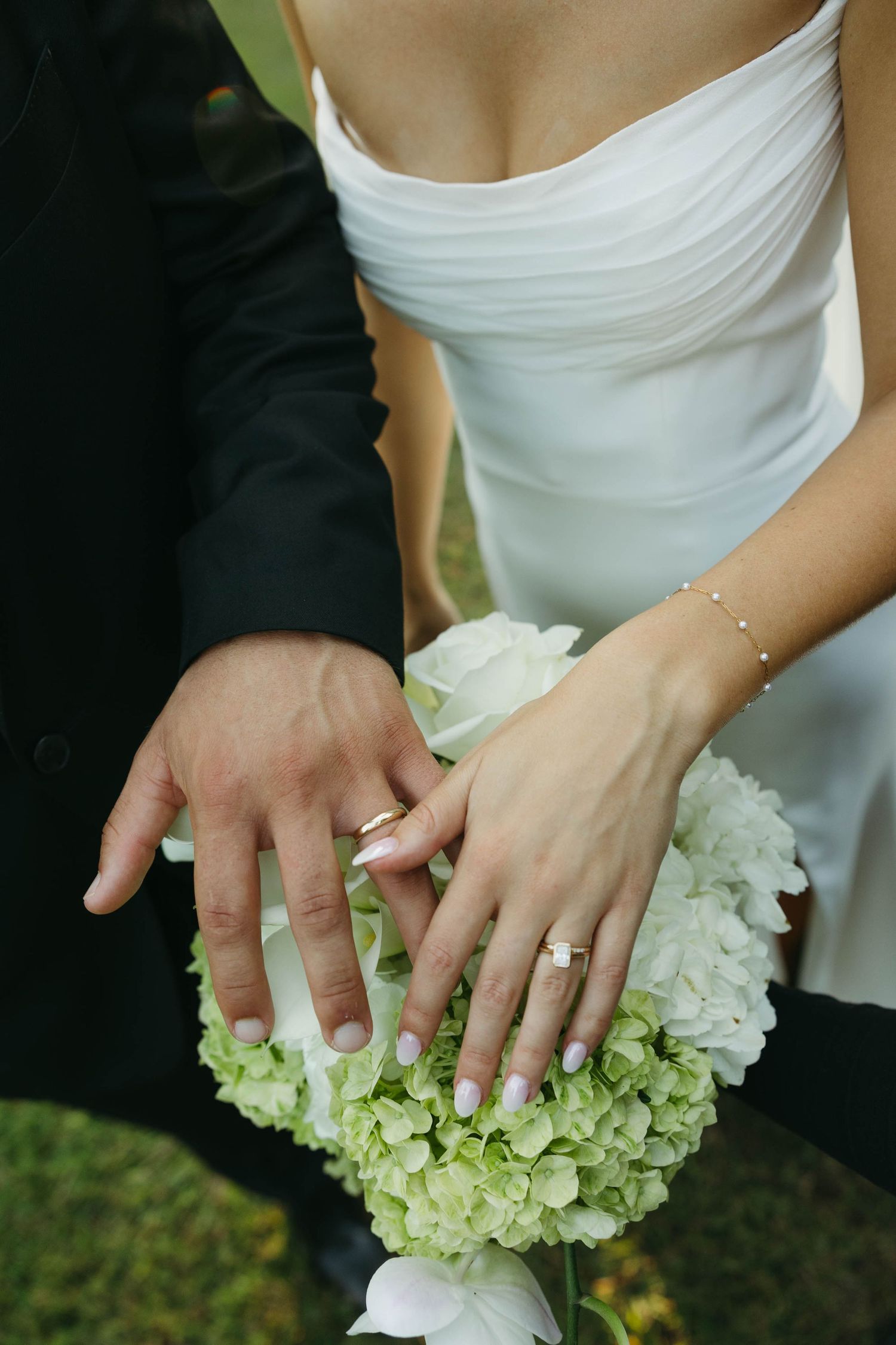 Birmingham Alabama Photographer capturing bride and groom's hands, at Iris Woods Venue in Nashville, Tennessee