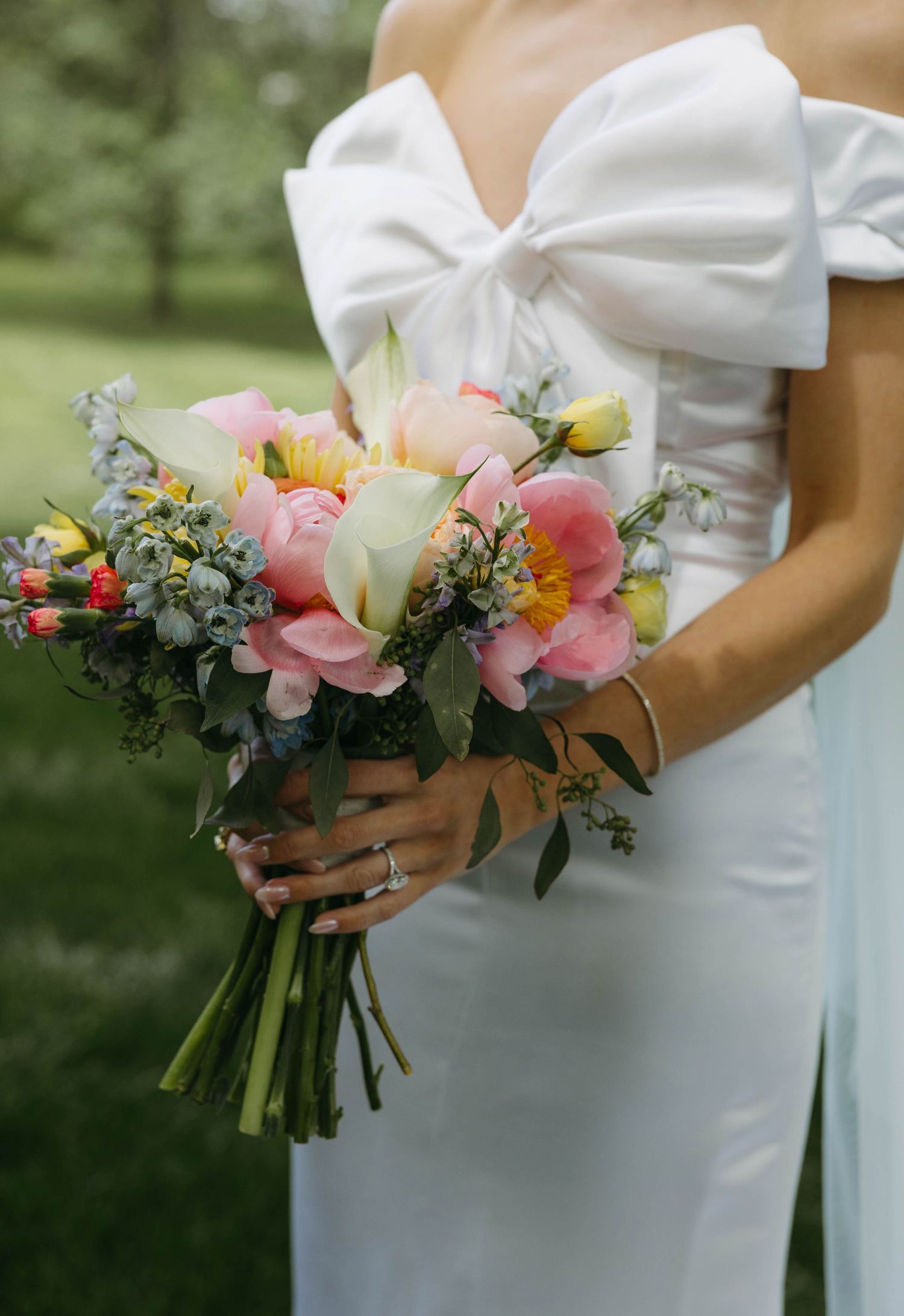 bride holding flowers