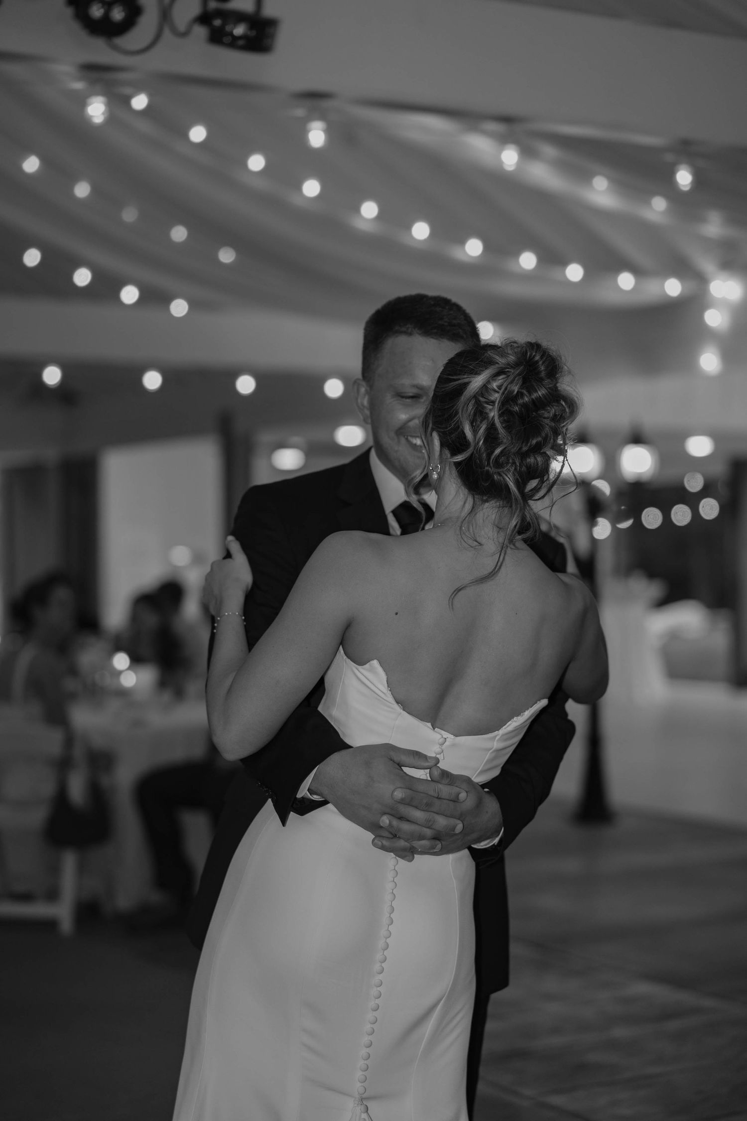 Birmingham Alabama Photographer capturing bride and groom having their first dance, at Iris Woods Venue in Nashville, Tennessee