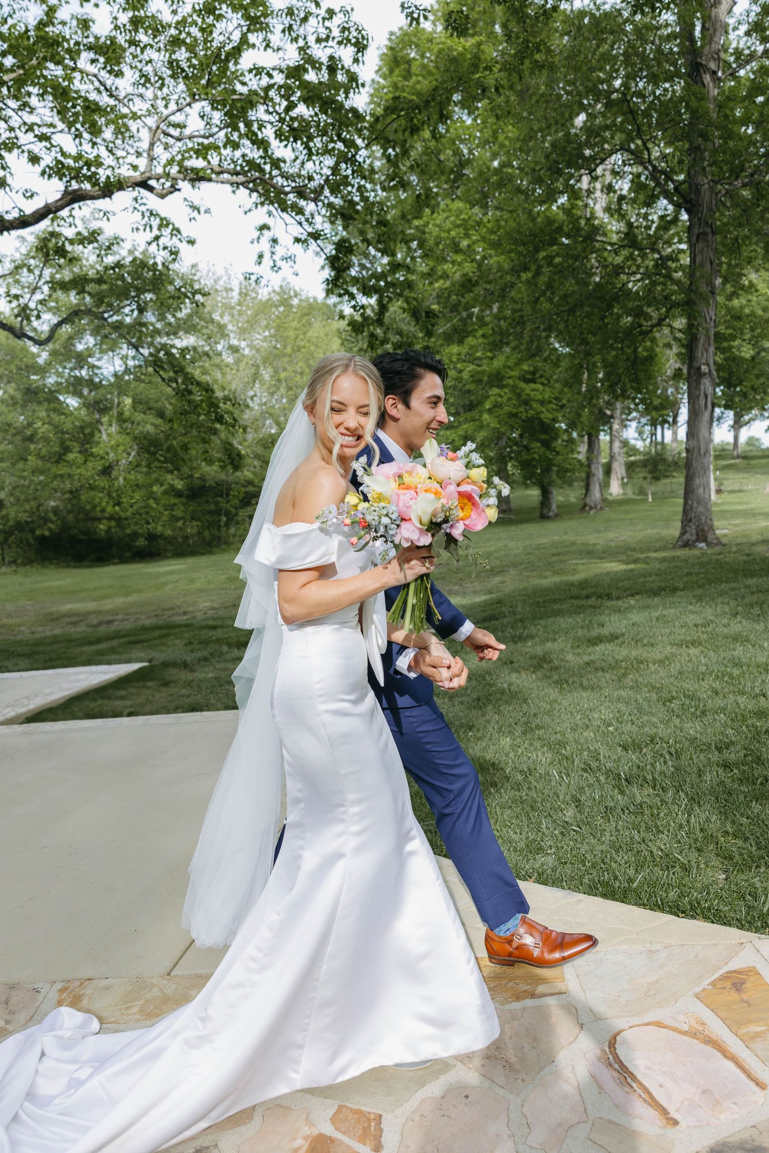Birmingham Alabama Photographer capturing Bride and groom walking down the isle, at iris woods wedding venue in Nashville Tennessee
