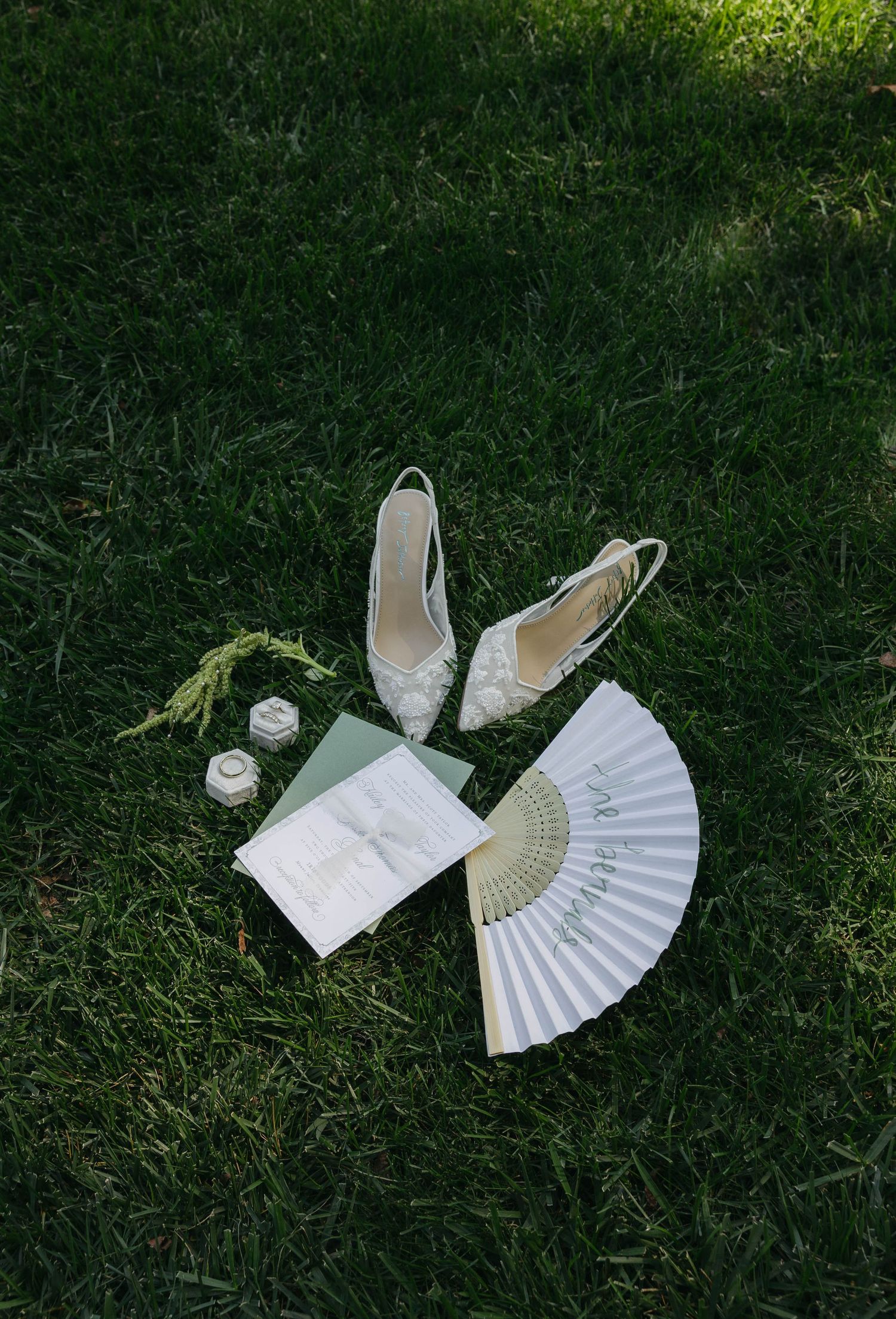 Birmingham Alabama Photographer capturing bride's wedding details and invitations at Iris Woods Venue in Nashville, Tennessee
