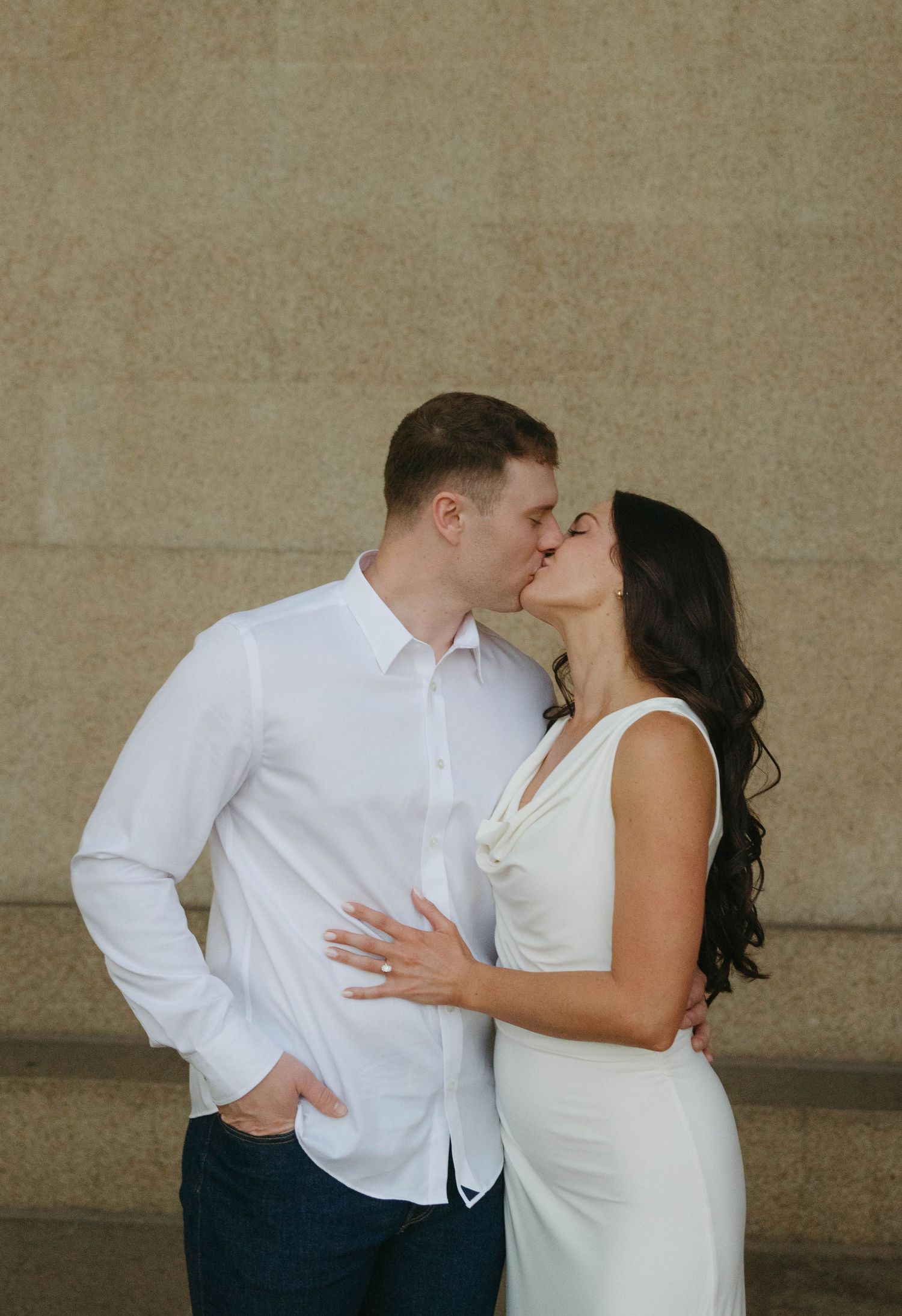 Birmingham Alabama Photographer capturing an engagement session of a couple kissing in Nashville Tennessee at the Parthenon