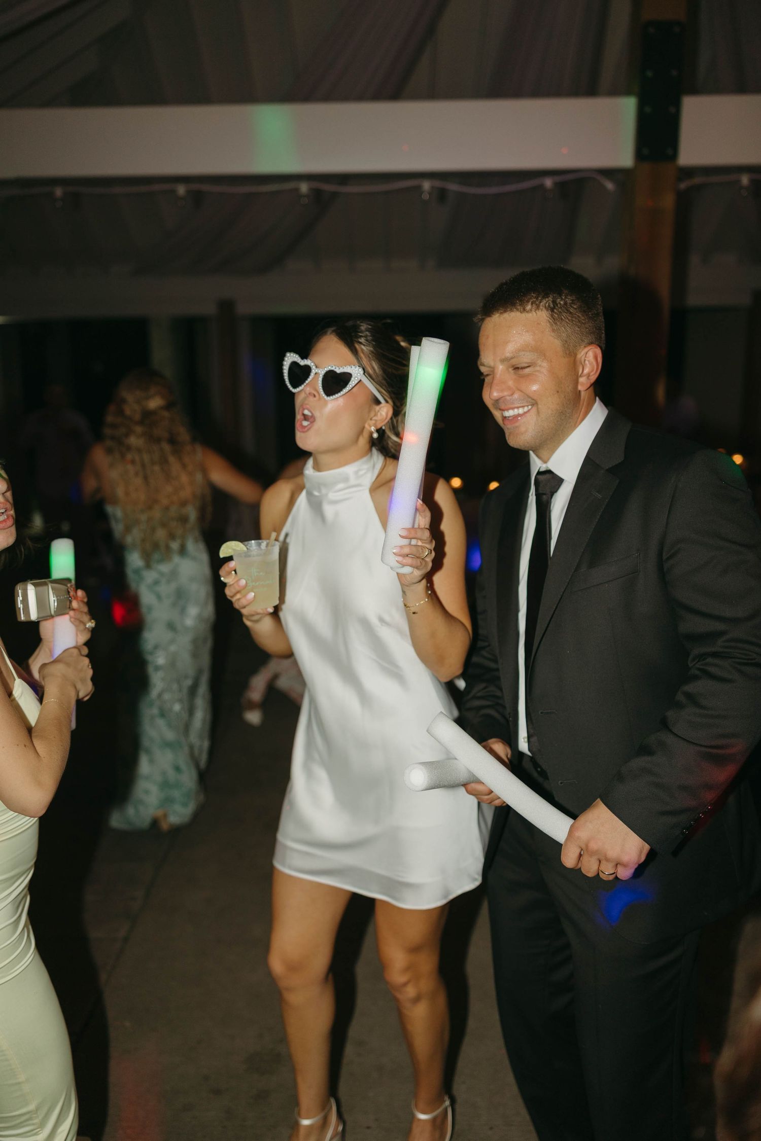 Birmingham Alabama Photographer capturing bride and groom dancing during the reception, at Iris Woods Venue in Nashville, Tennessee