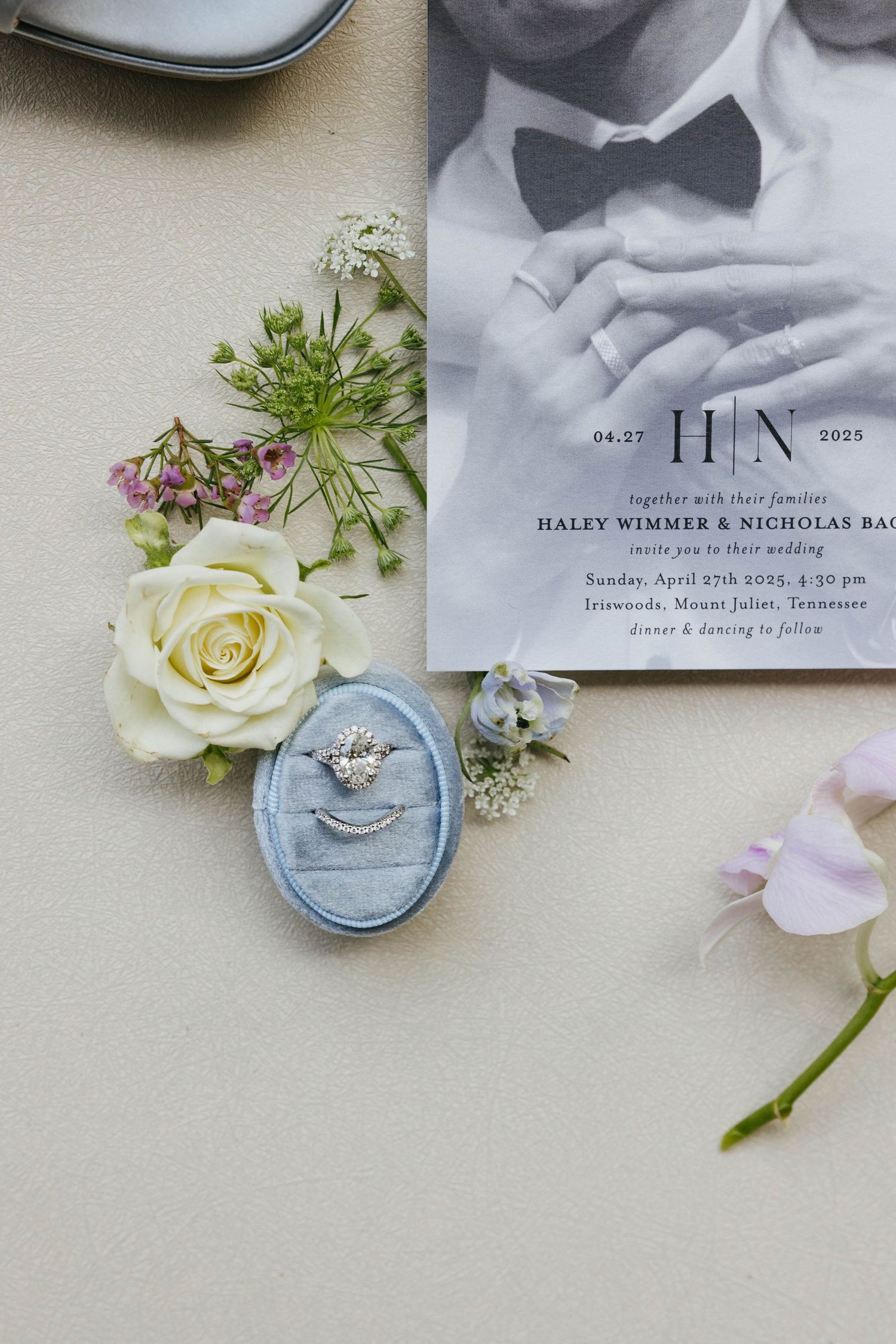 flat lay of bride and groom details
